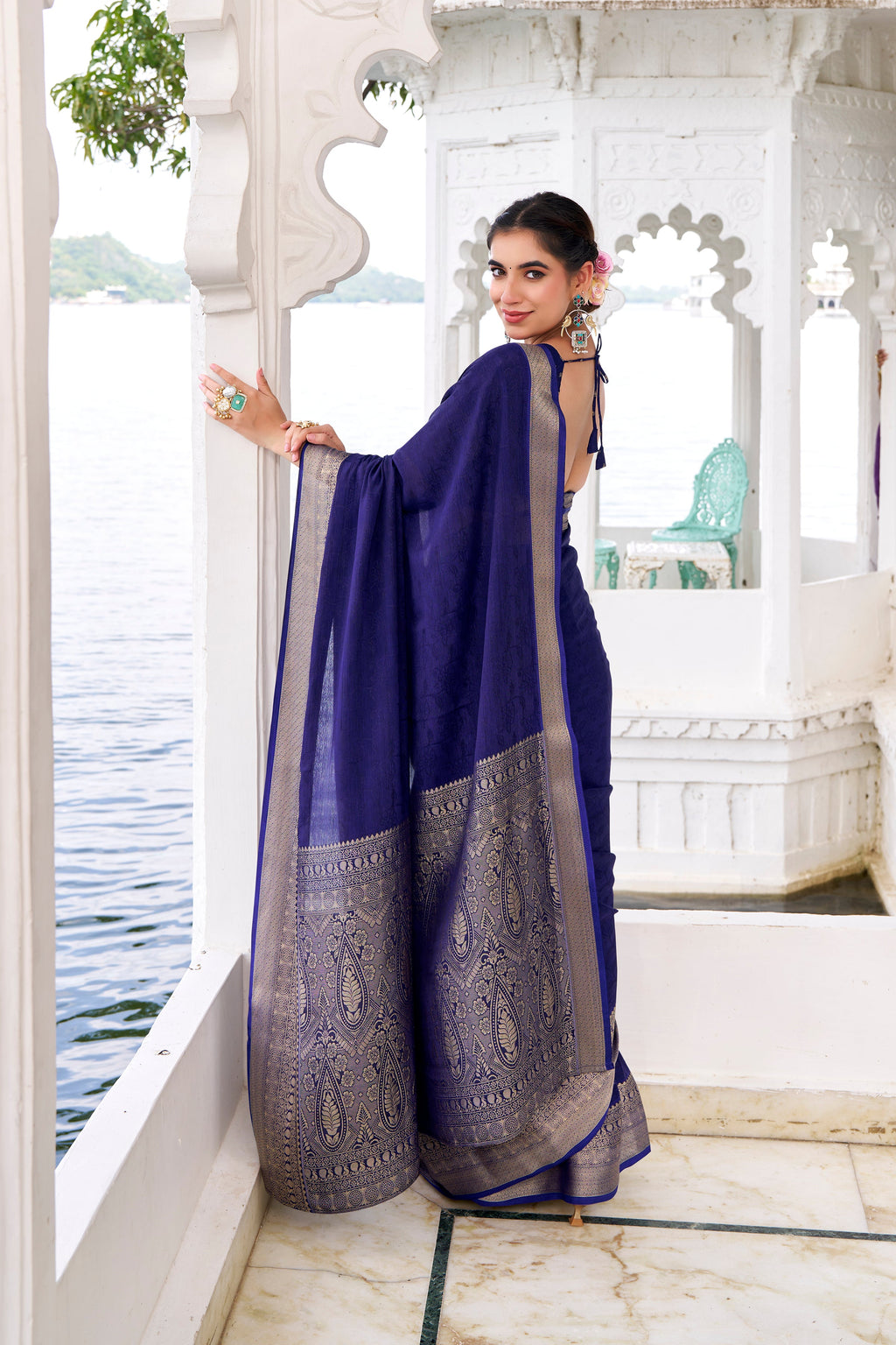 Navy blue chinon self-printed zari weaving saree with blouse