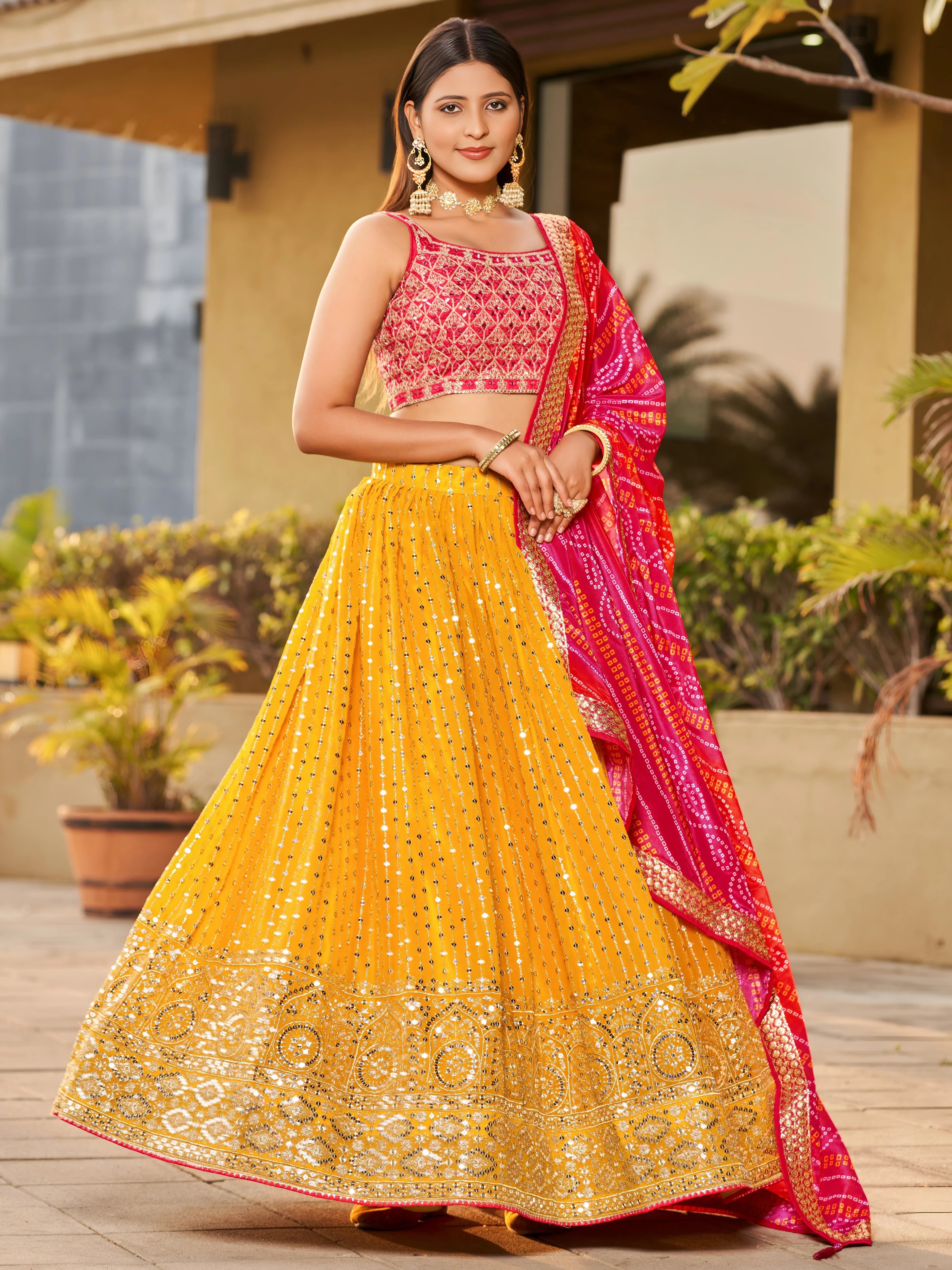 Navya mustard yellow embroidered lehenga choli with Bandhani dupatta