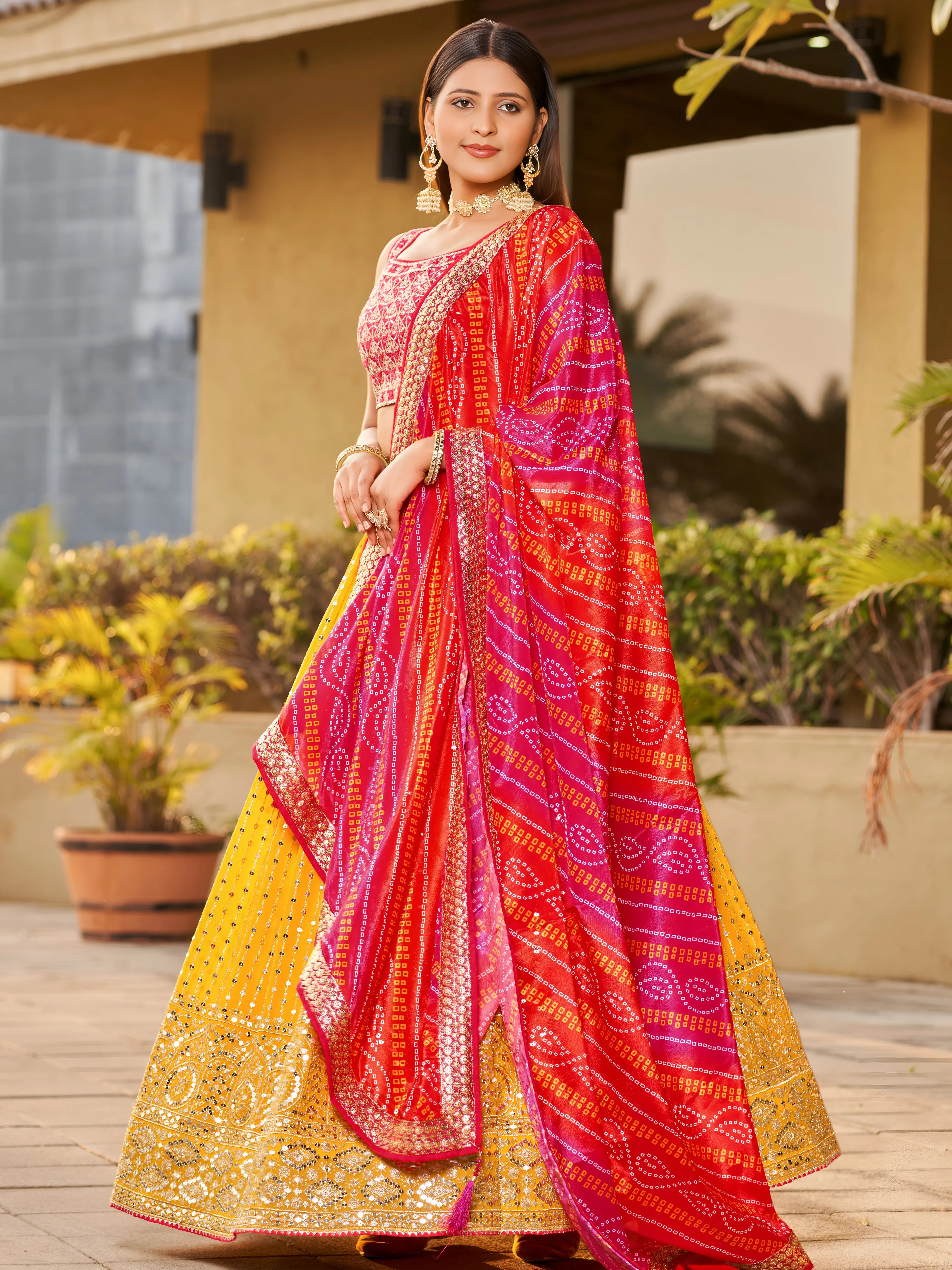 Navya mustard yellow embroidered lehenga choli with Bandhani dupatta