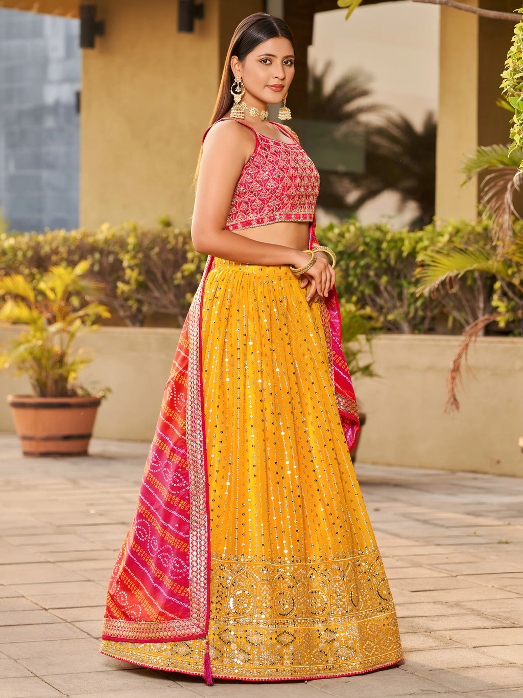 Navya mustard yellow embroidered lehenga choli with Bandhani dupatta