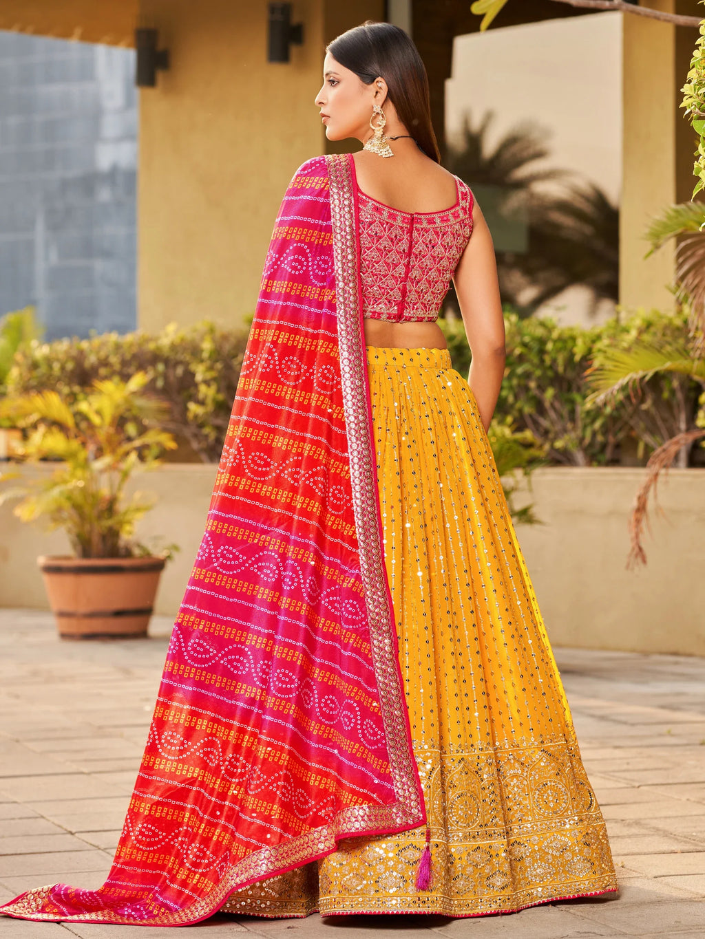Navya mustard yellow embroidered lehenga choli with Bandhani dupatta