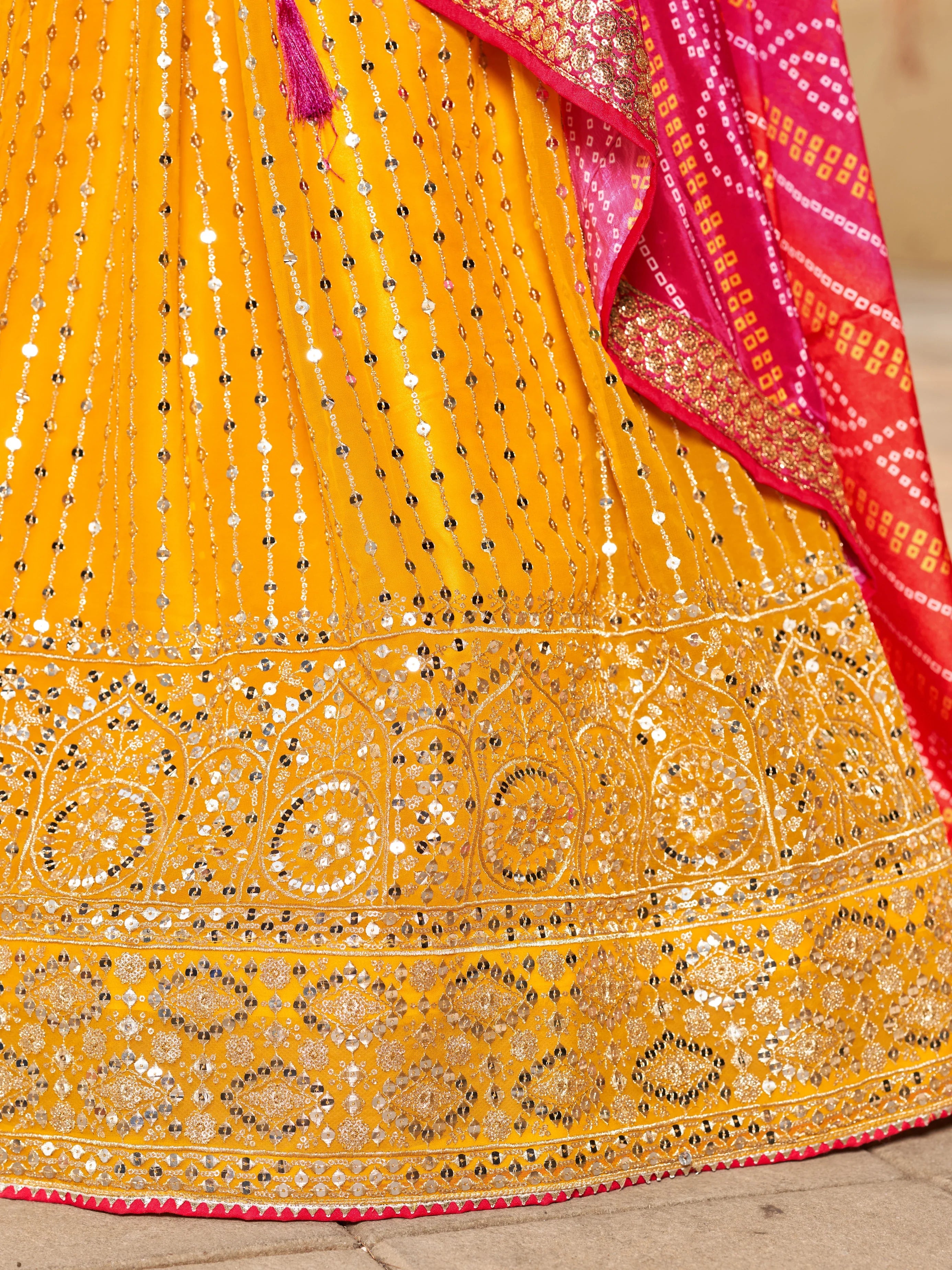 Navya mustard yellow embroidered lehenga choli with Bandhani dupatta
