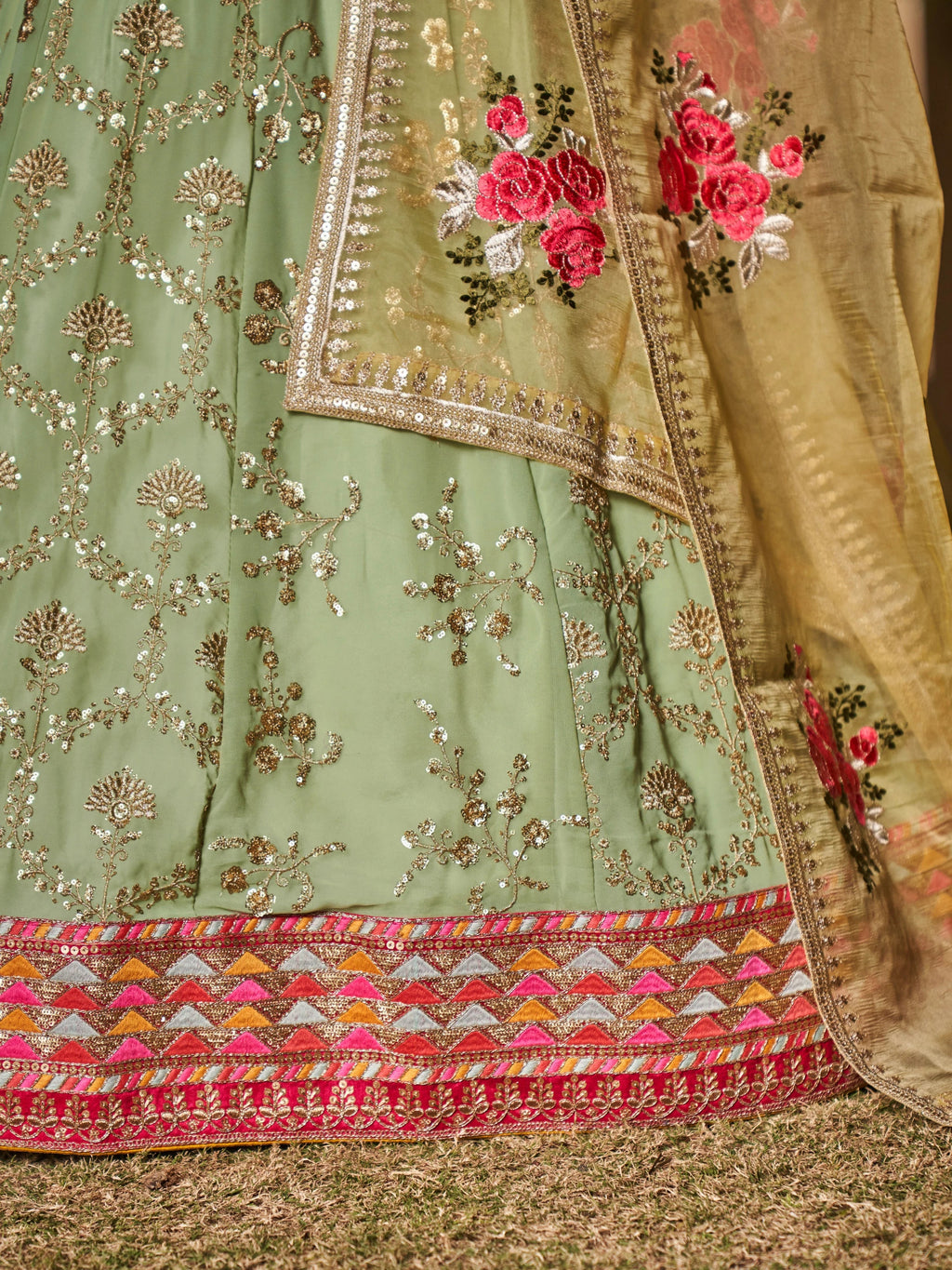 Navya pista green embroidered lehenga choli with floral dupatta