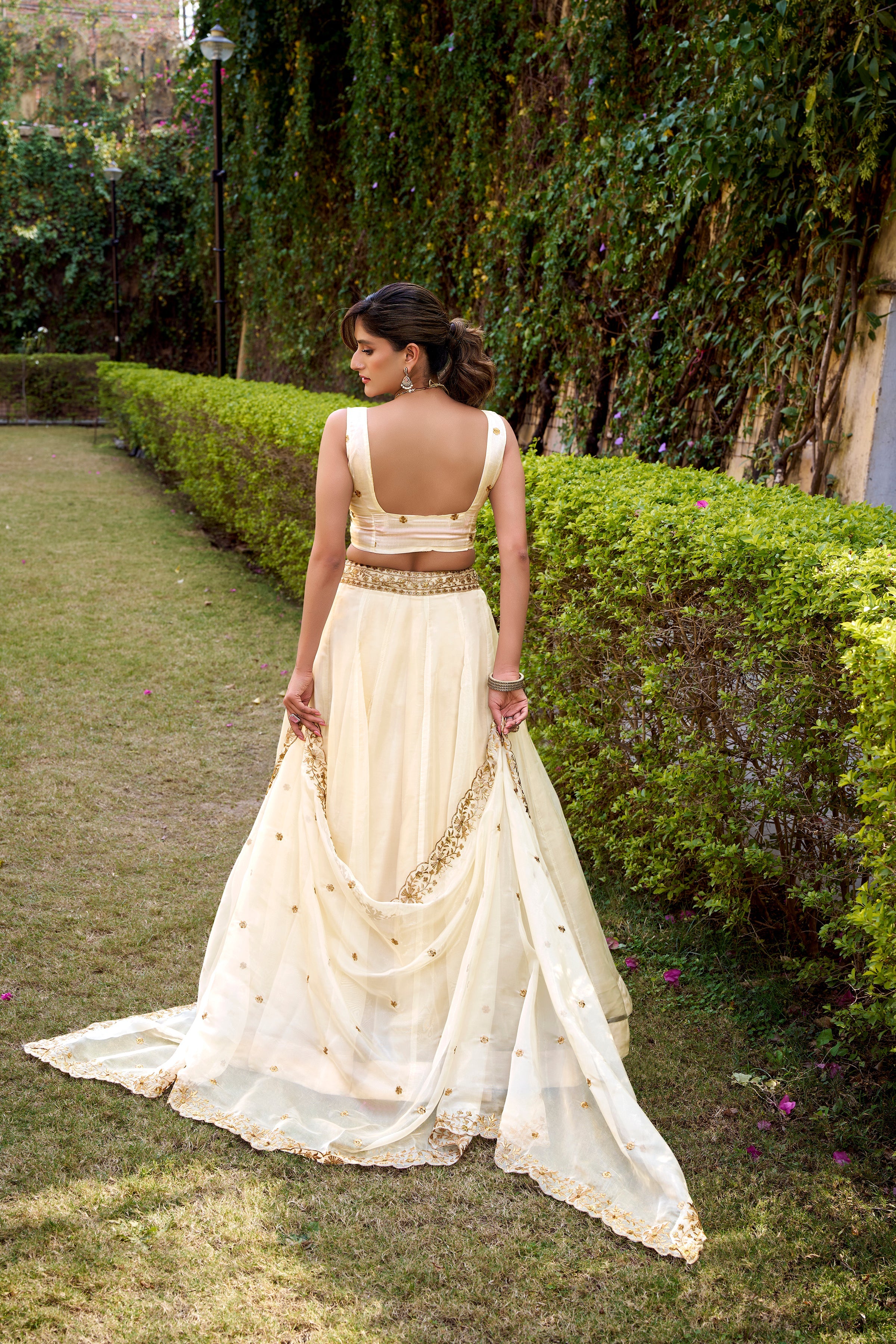 Nayana off-white Chanda silk lehenga choli with sequins thread embroidery work
