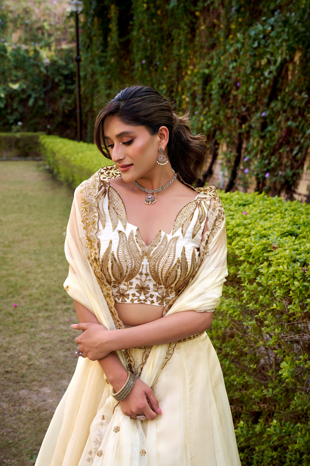 Nayana off-white Chanda silk lehenga choli with sequins thread embroidery work