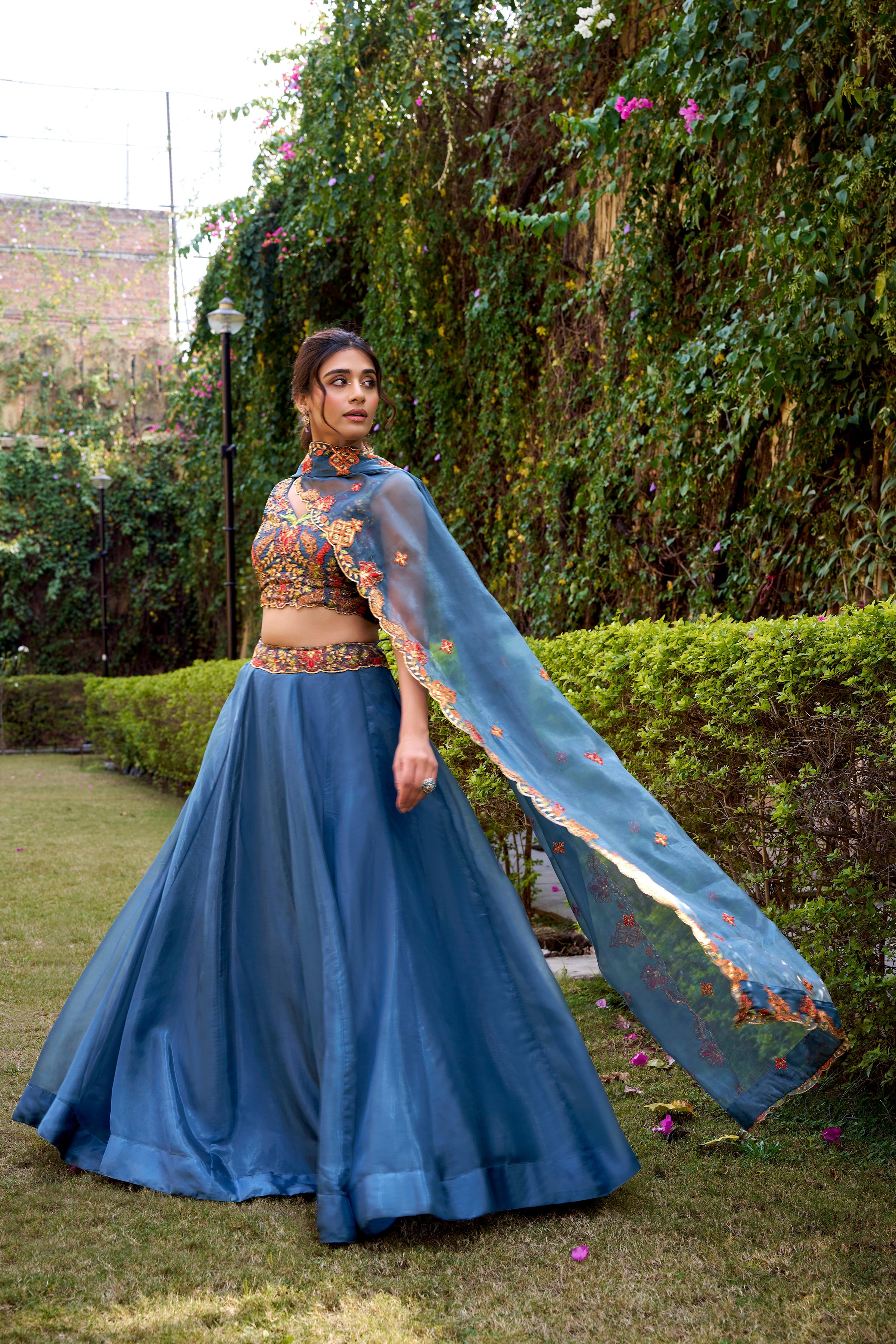 Nayana teal Chanda silk lehenga choli with sequins thread embroidery work