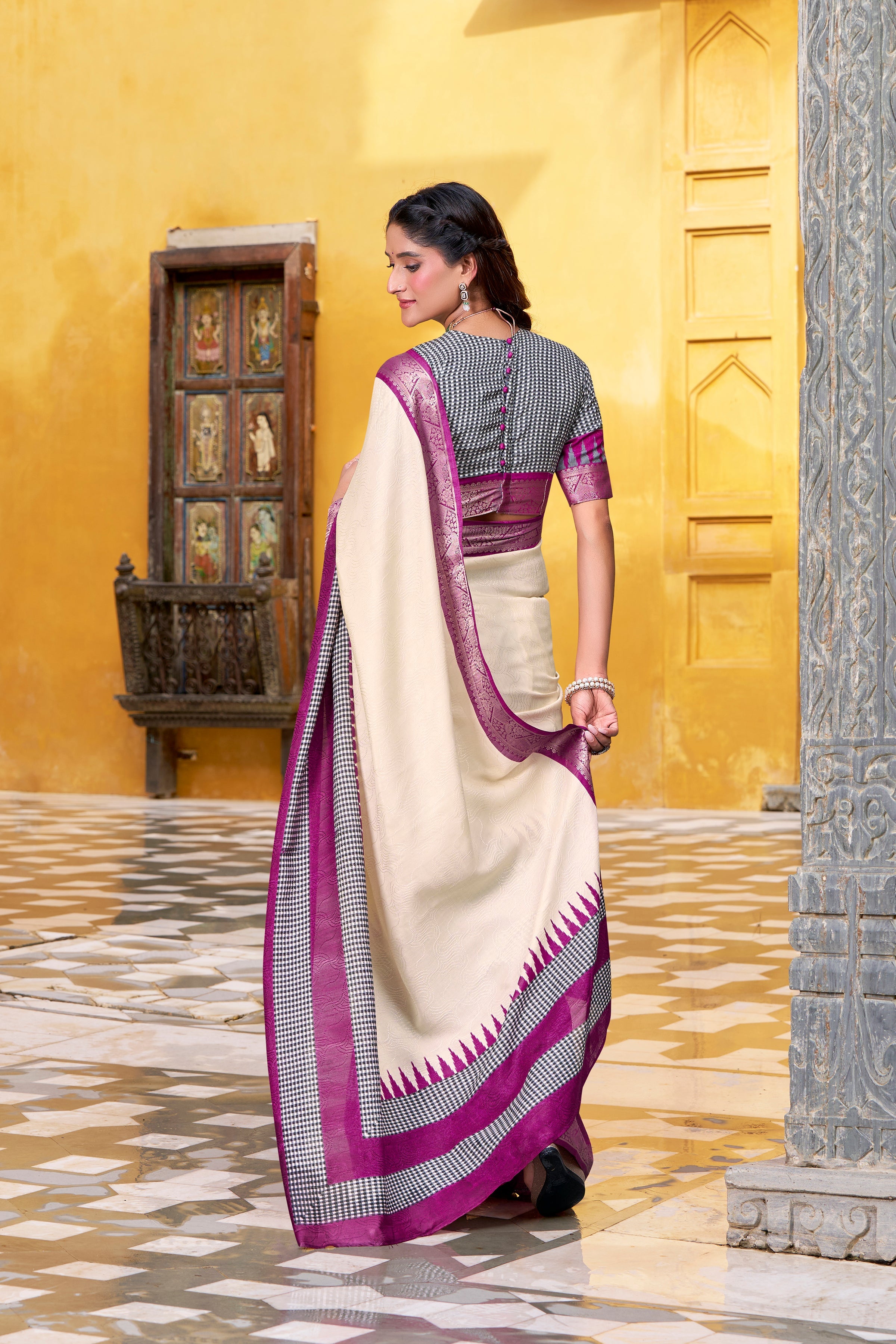 Off-white poly cotton printed saree with zari weaving border and blouse