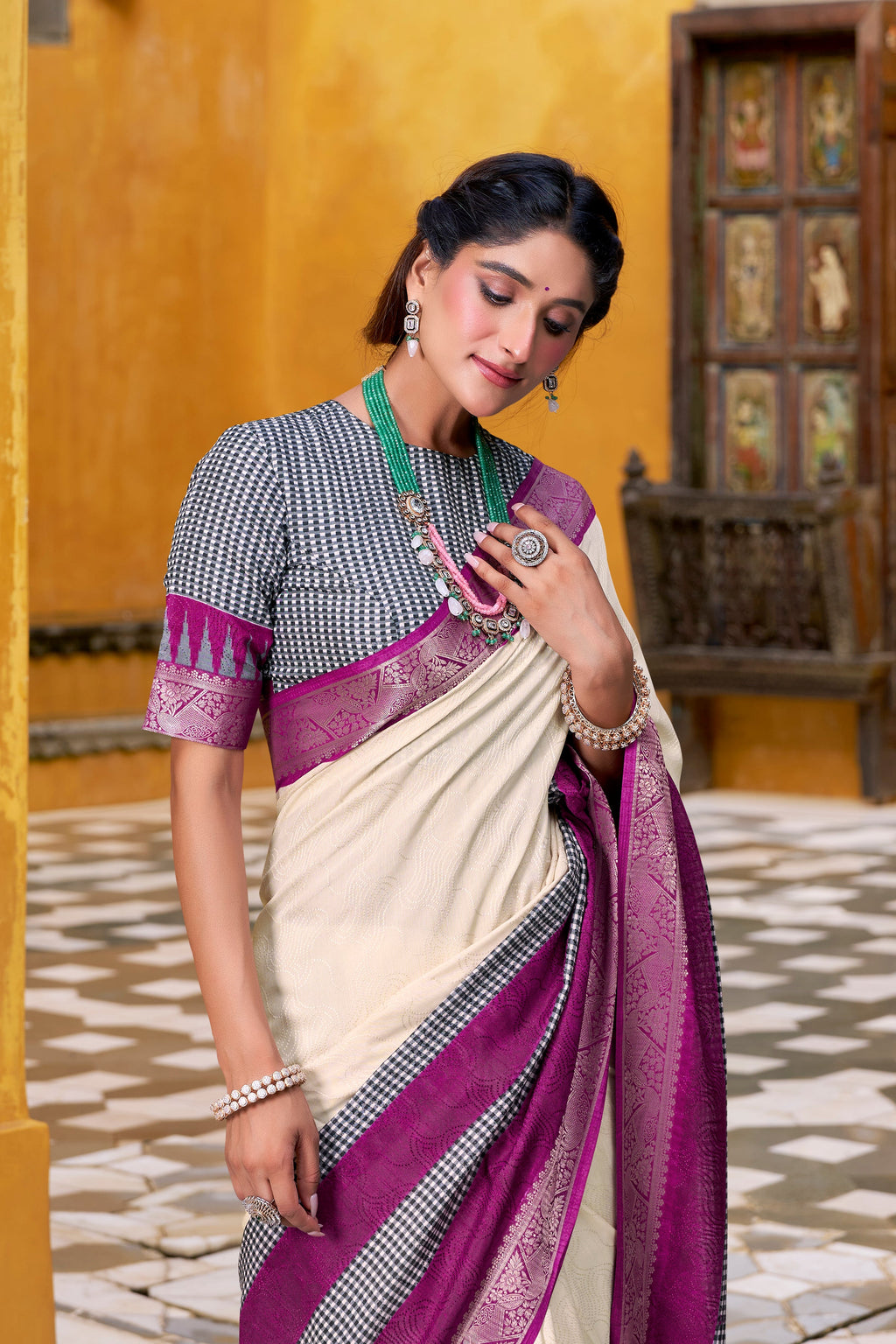 Off-white poly cotton printed saree with zari weaving border and blouse