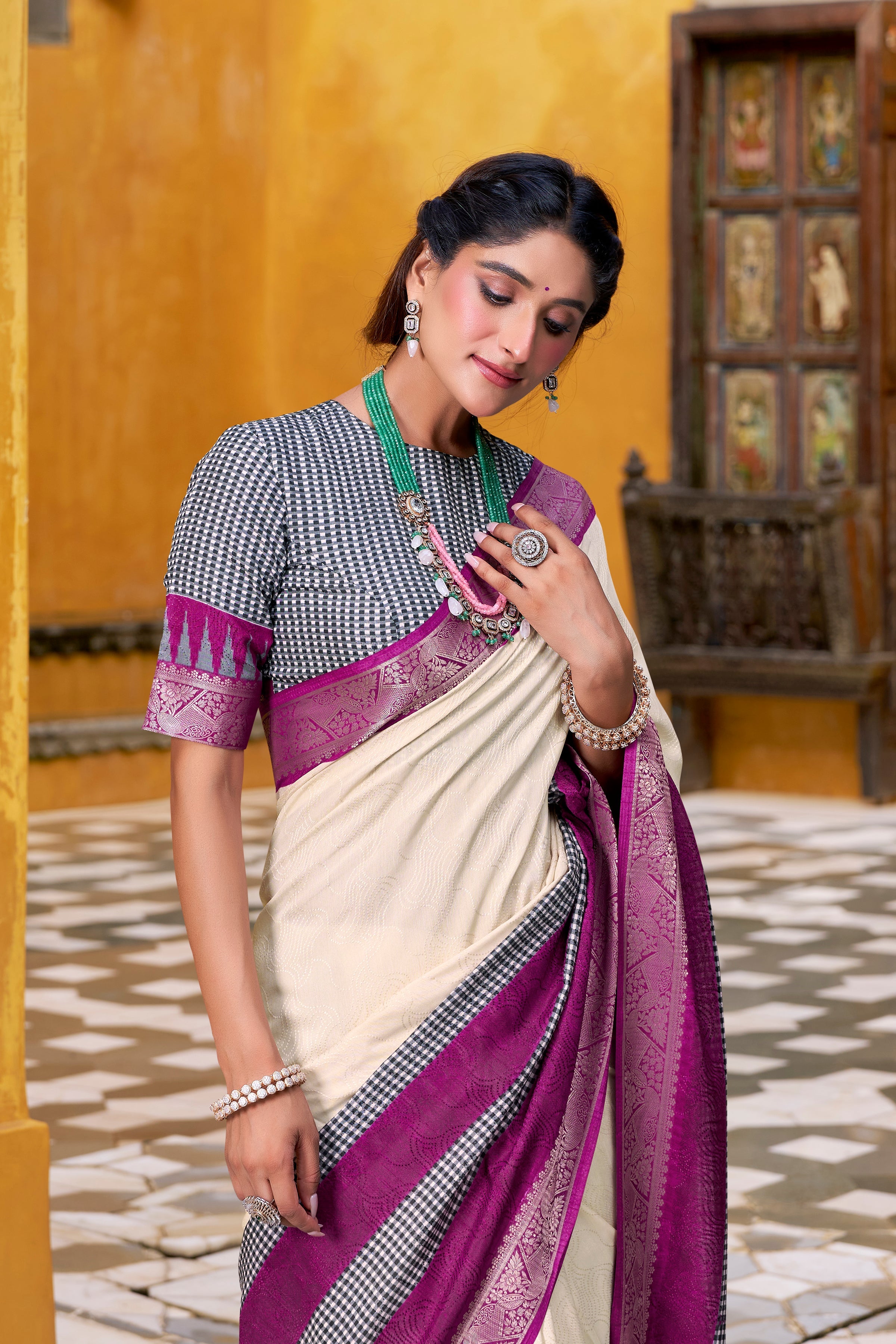 Off-white poly cotton printed saree with zari weaving border and blouse