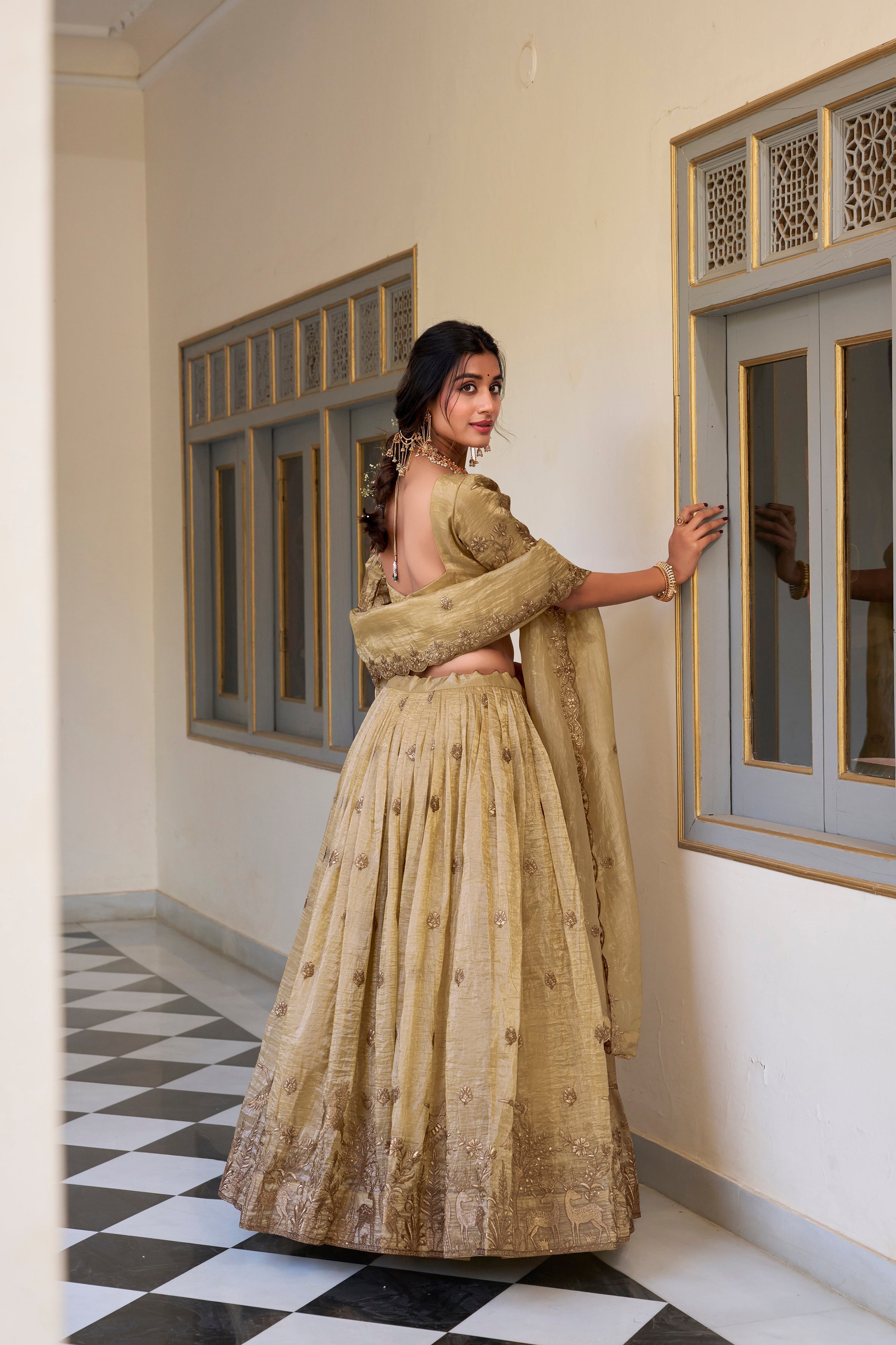 Off-white gold crush sequins thread embroidery work lehenga choli