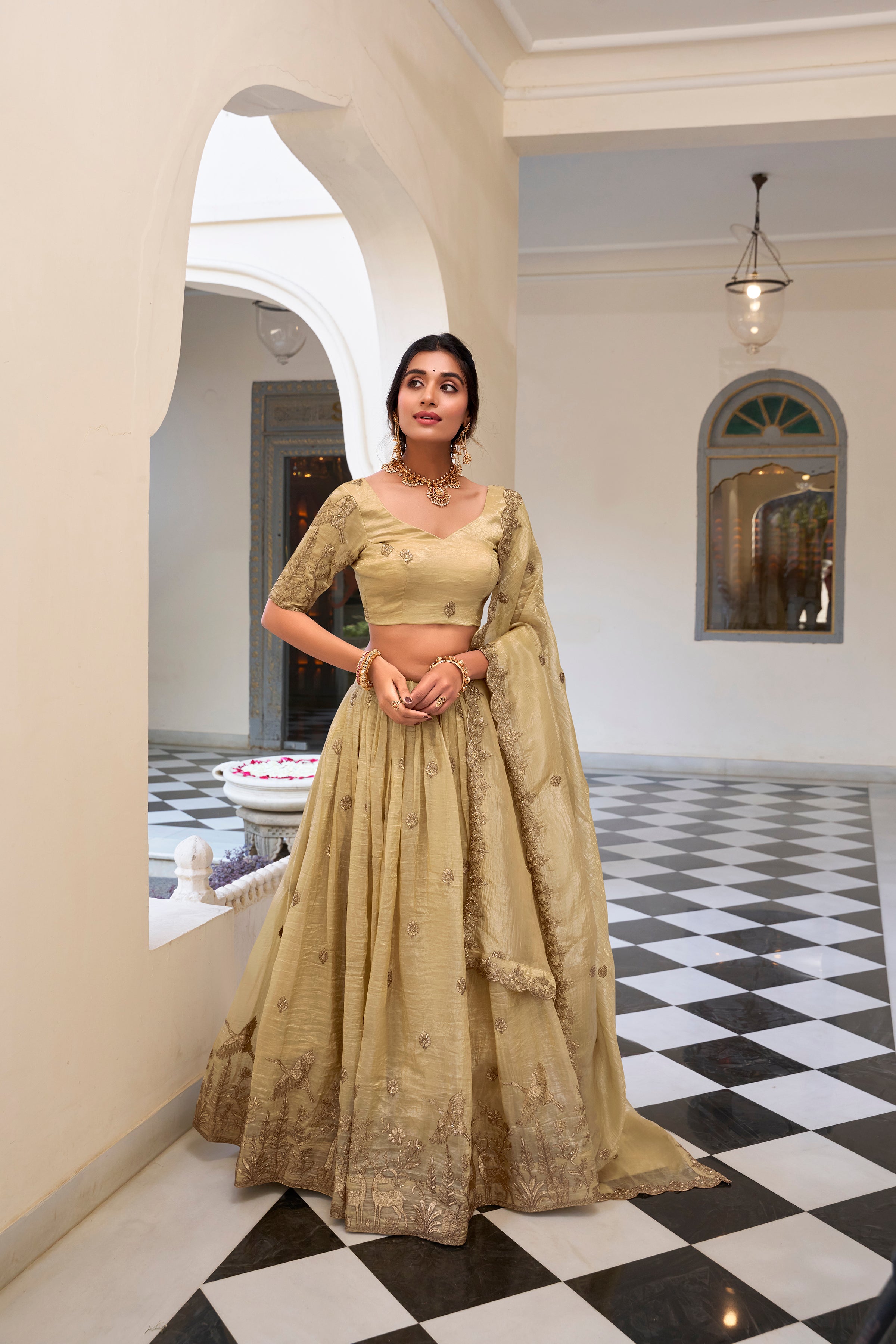 Off-white gold crush sequins thread embroidery work lehenga choli