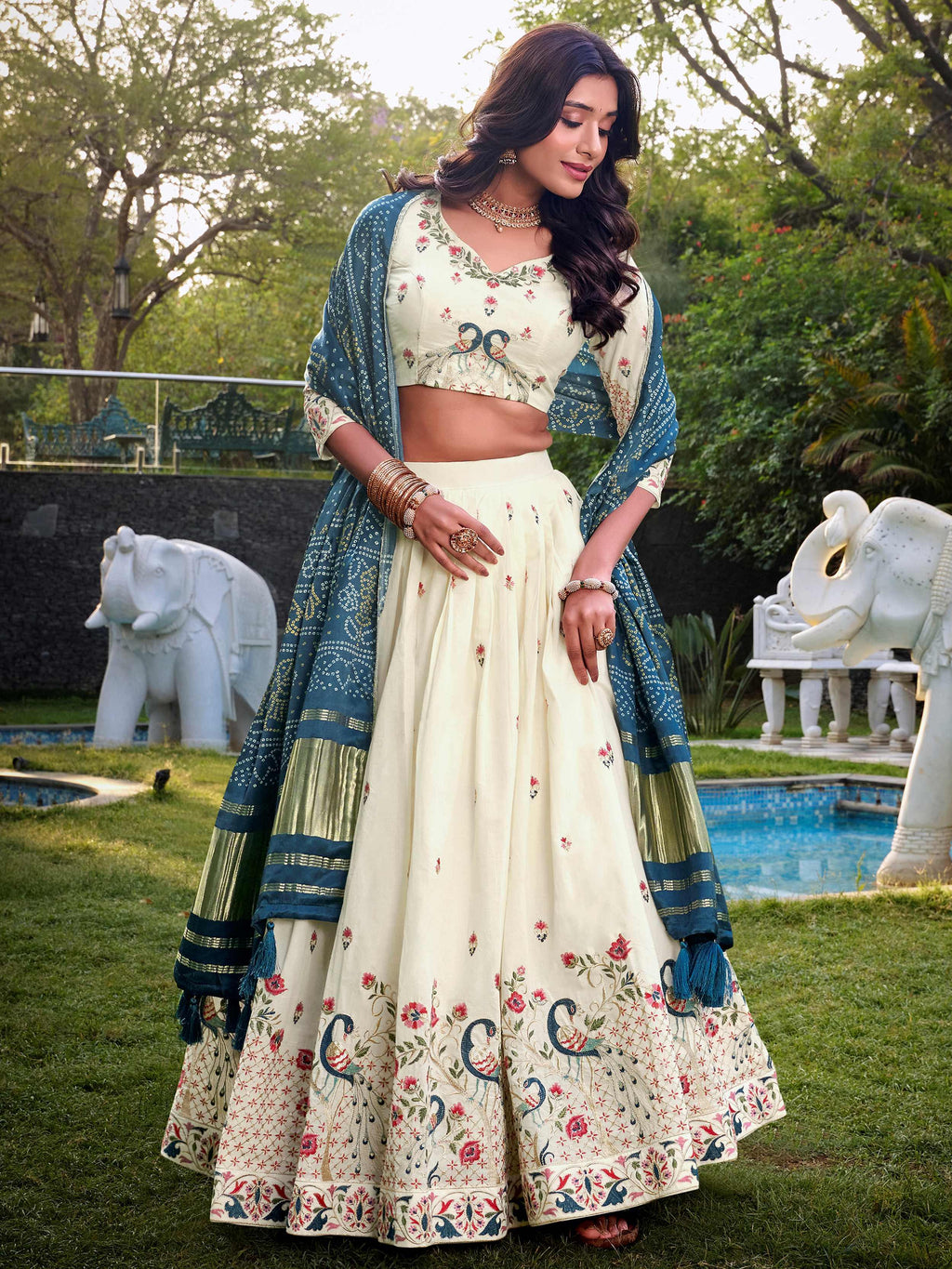 Off-white Khadi cotton sequins embroidered lehenga choli with blue dupatta