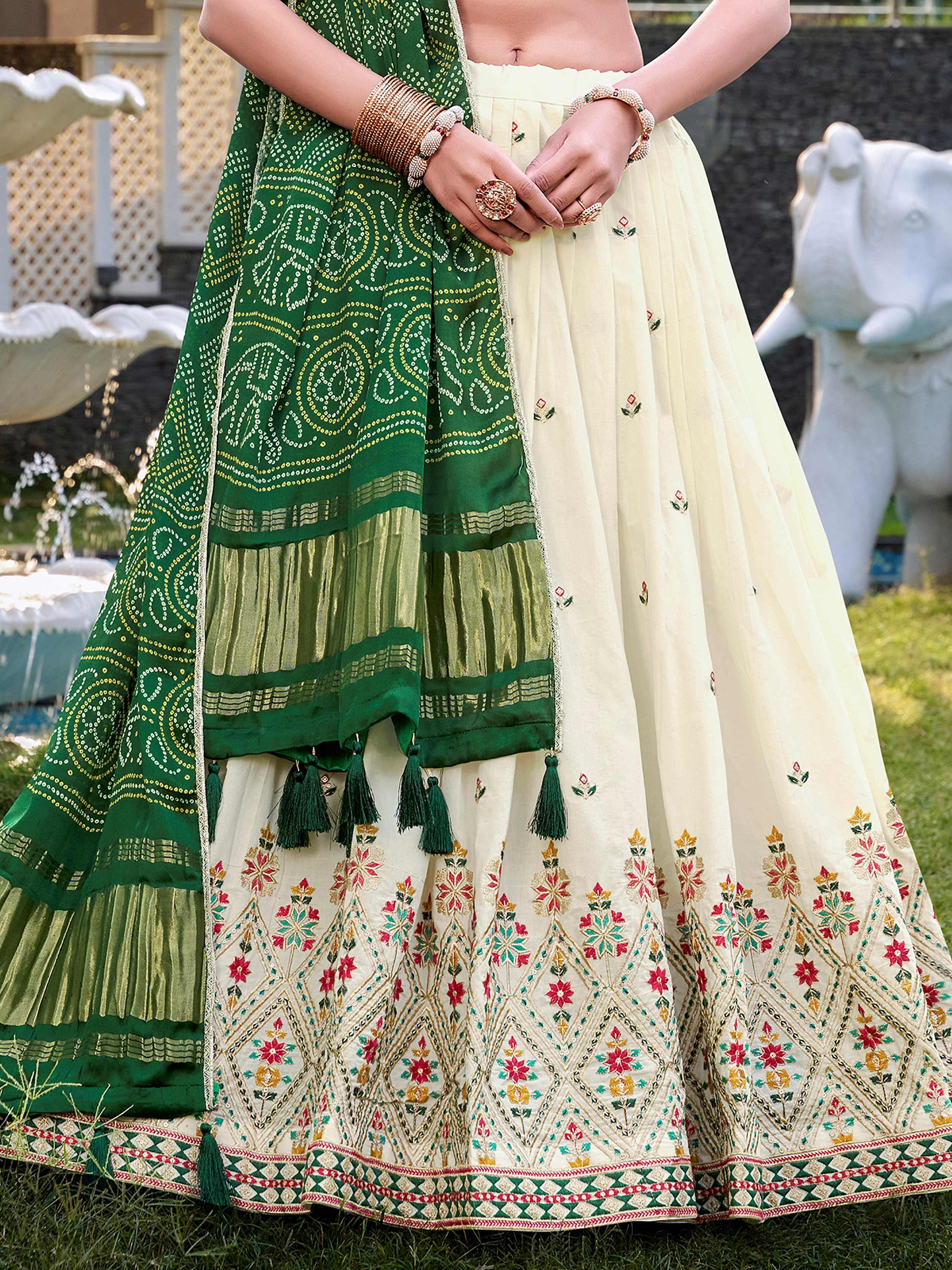 Off-white Khadi cotton sequins embroidered lehenga choli with green dupatta