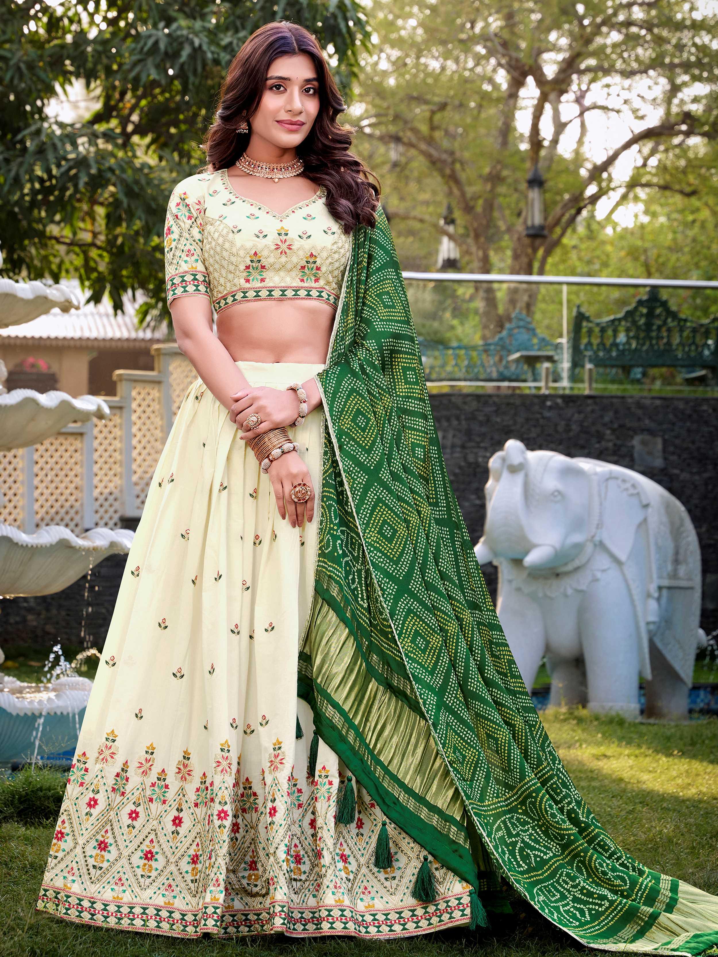 Off-white Khadi cotton sequins embroidered lehenga choli with green dupatta