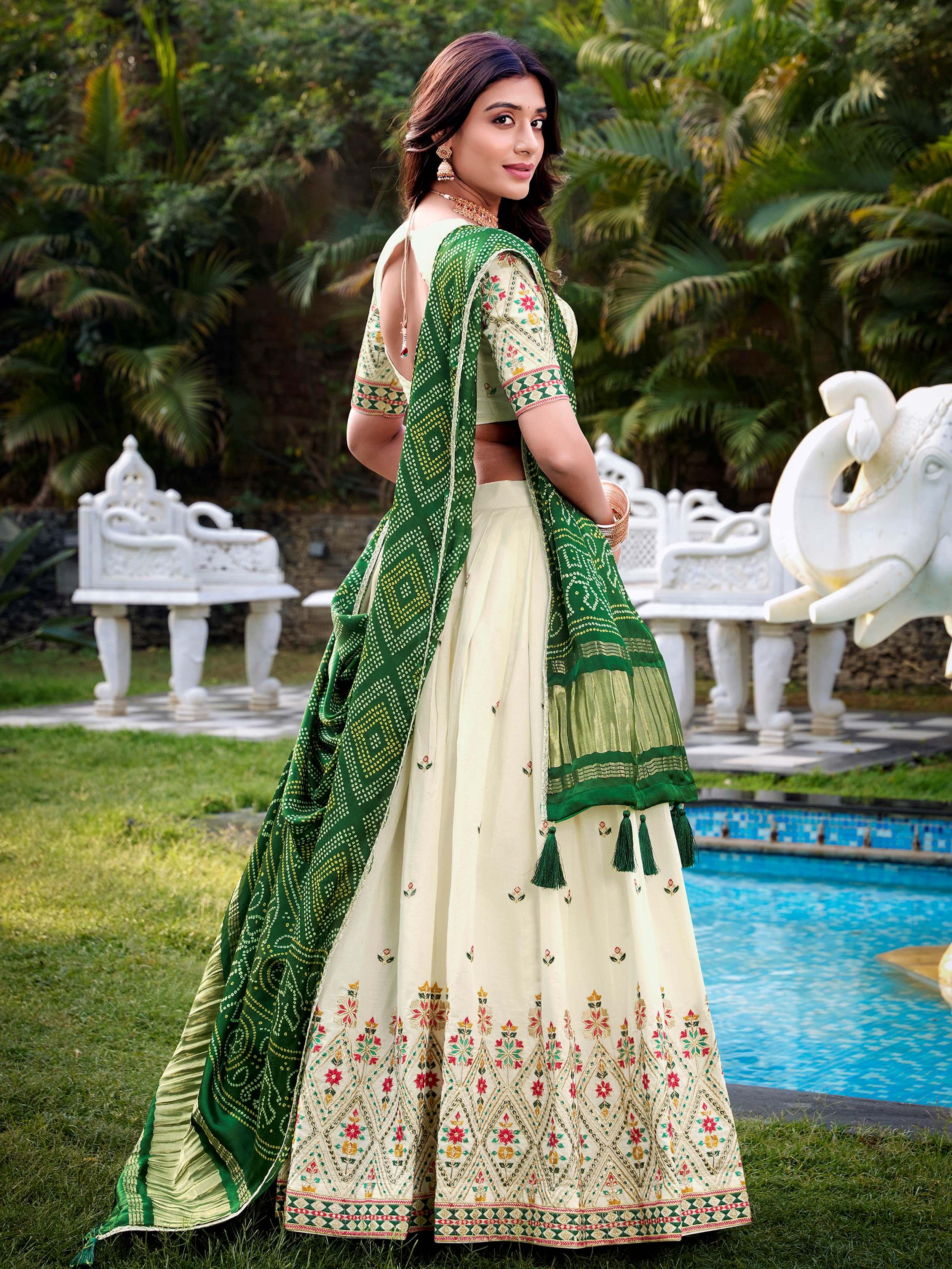 Off-white Khadi cotton sequins embroidered lehenga choli with green dupatta