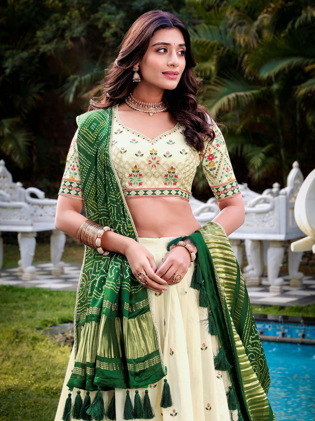 Off-white Khadi cotton sequins embroidered lehenga choli with green dupatta