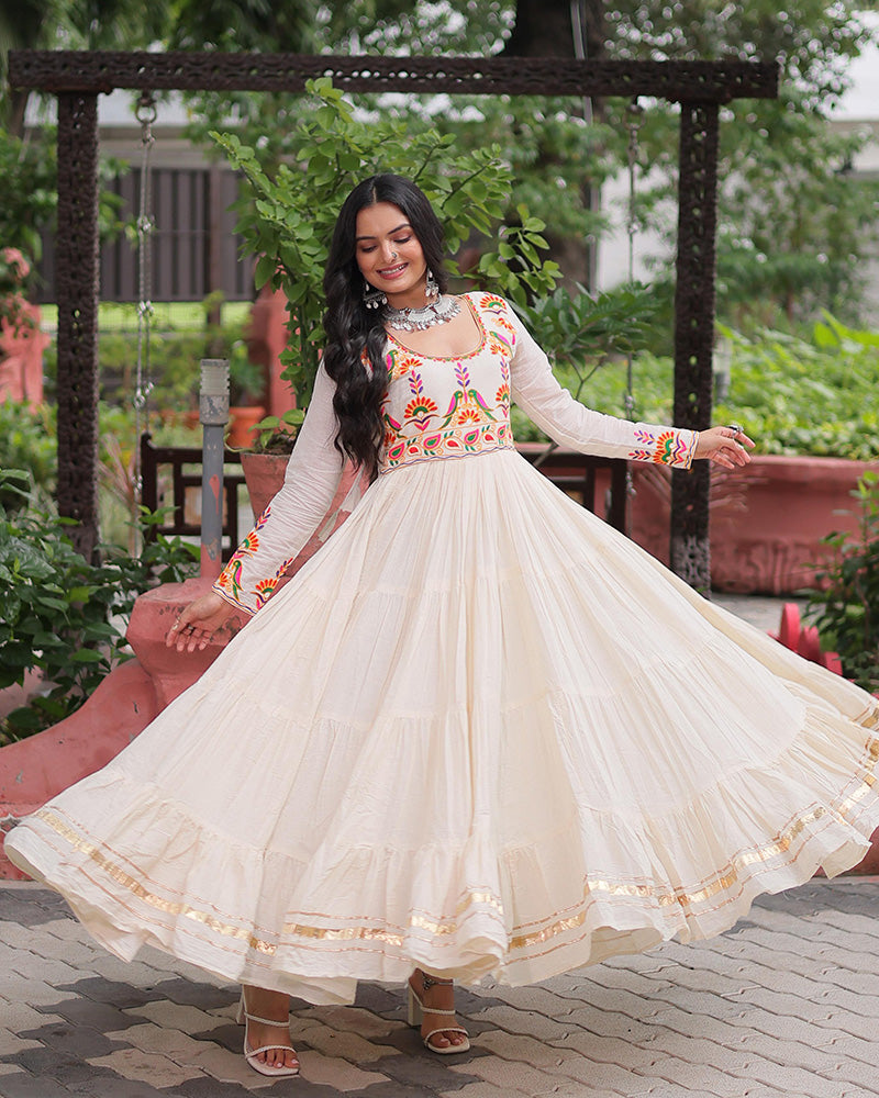 Off-white cotton flared gown with thread embroidery and Gota Patti work