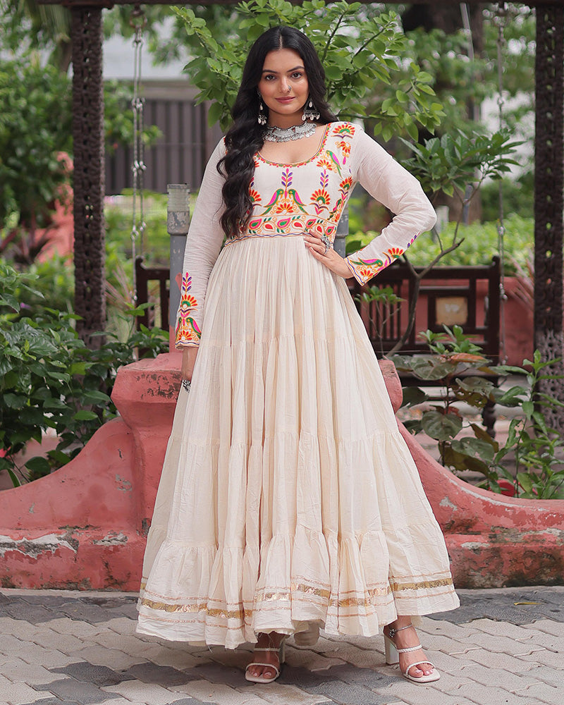 Off-white cotton flared gown with thread embroidery and Gota Patti work