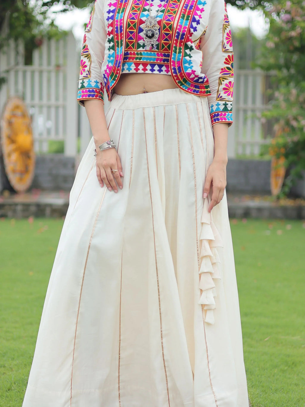 Off white Kutchi Gamthi embroidered Gota Patti lace lehenga choli with koti