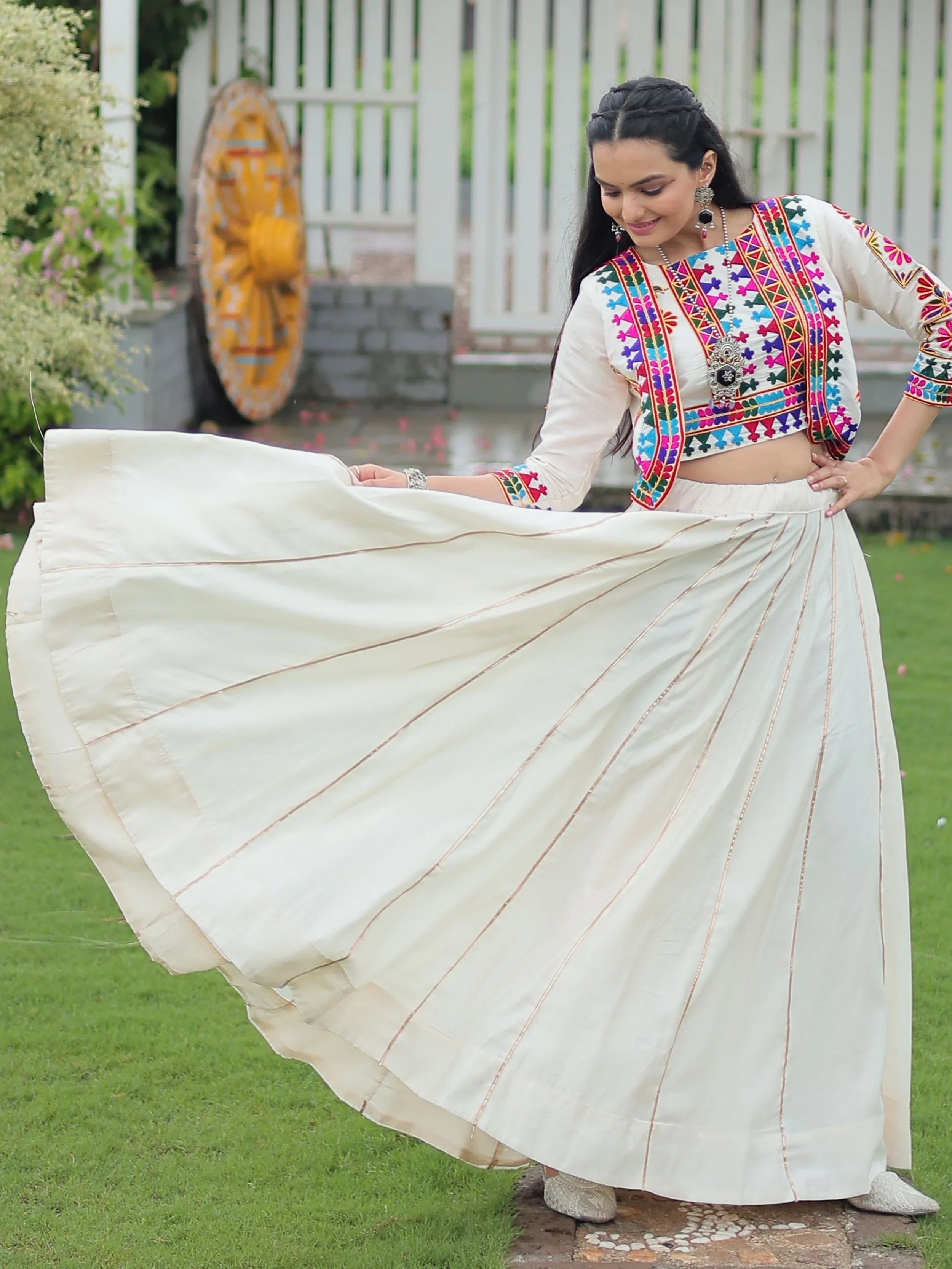 Off white Kutchi Gamthi embroidered Gota Patti lace lehenga choli with koti