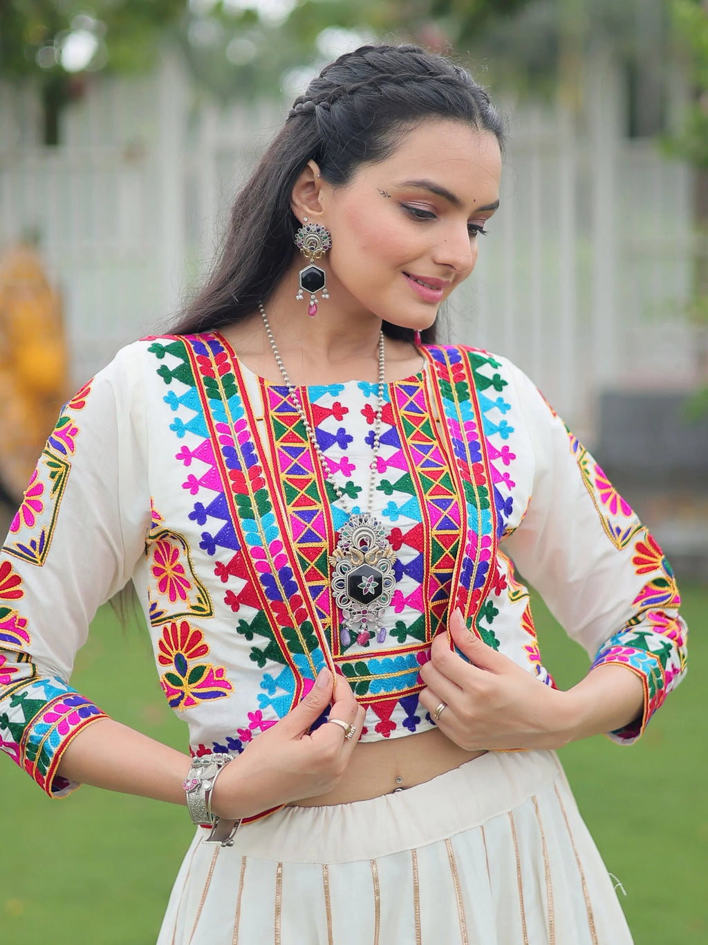 Off white Kutchi Gamthi embroidered Gota Patti lace lehenga choli with koti