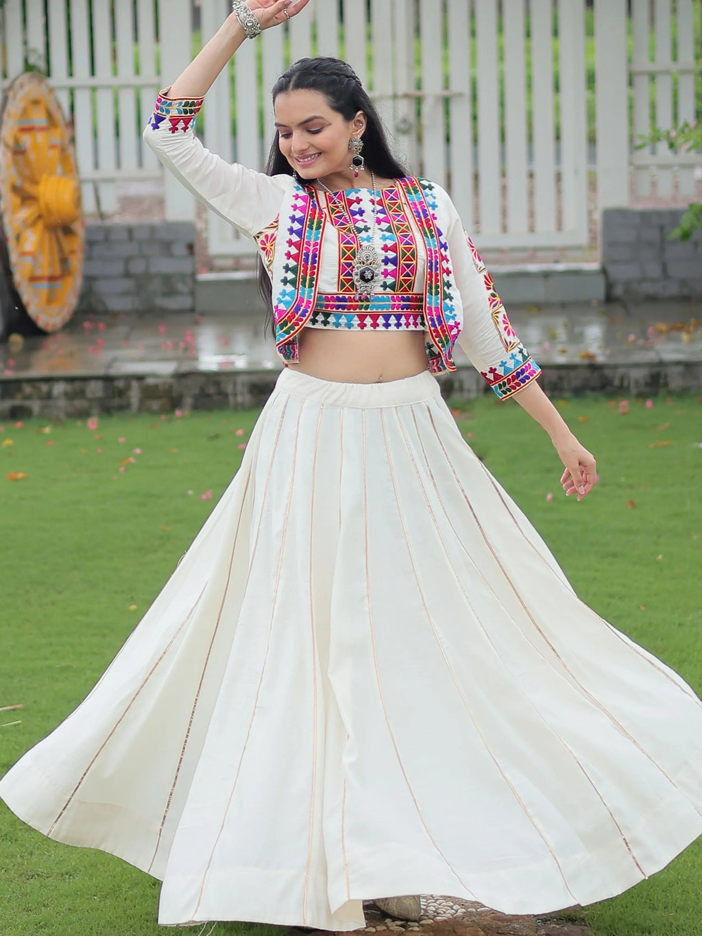 Off white Kutchi Gamthi embroidered Gota Patti lace lehenga choli with koti
