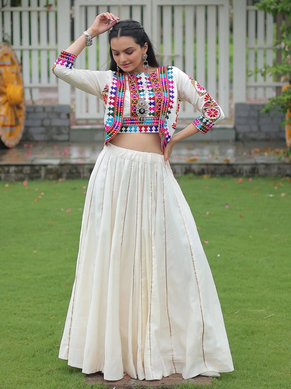 Off white Kutchi Gamthi embroidered Gota Patti lace lehenga choli with koti