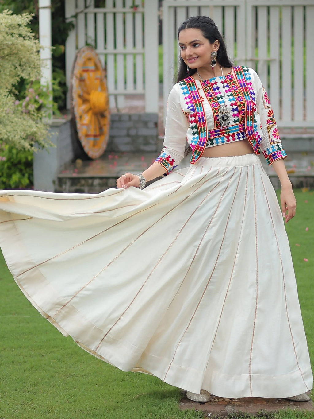 Off white Kutchi Gamthi embroidered Gota Patti lace lehenga choli with koti