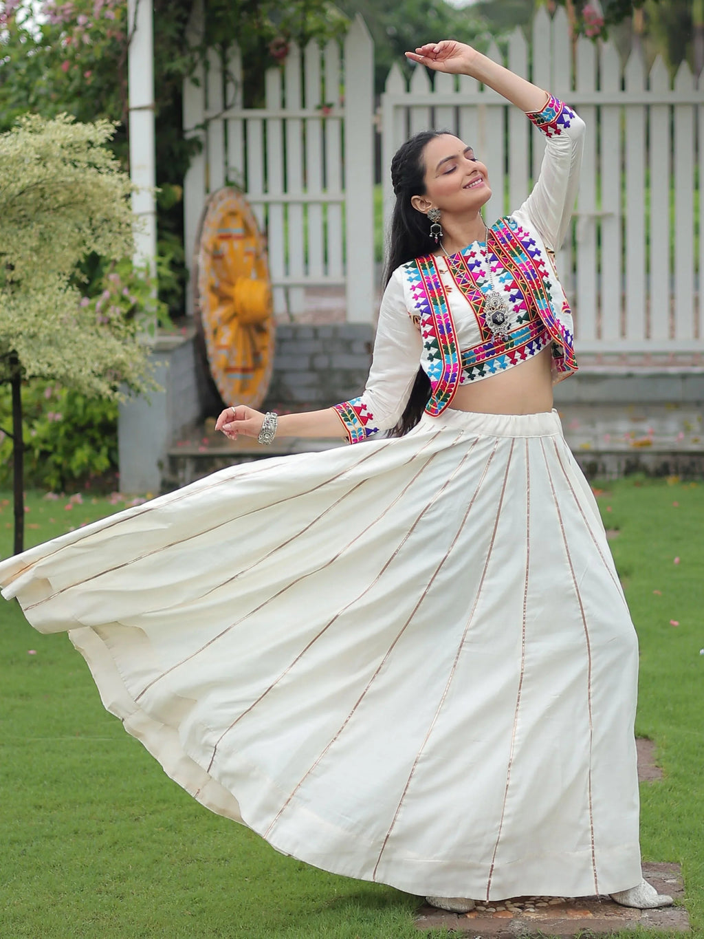 Off white Kutchi Gamthi embroidered Gota Patti lace lehenga choli with koti