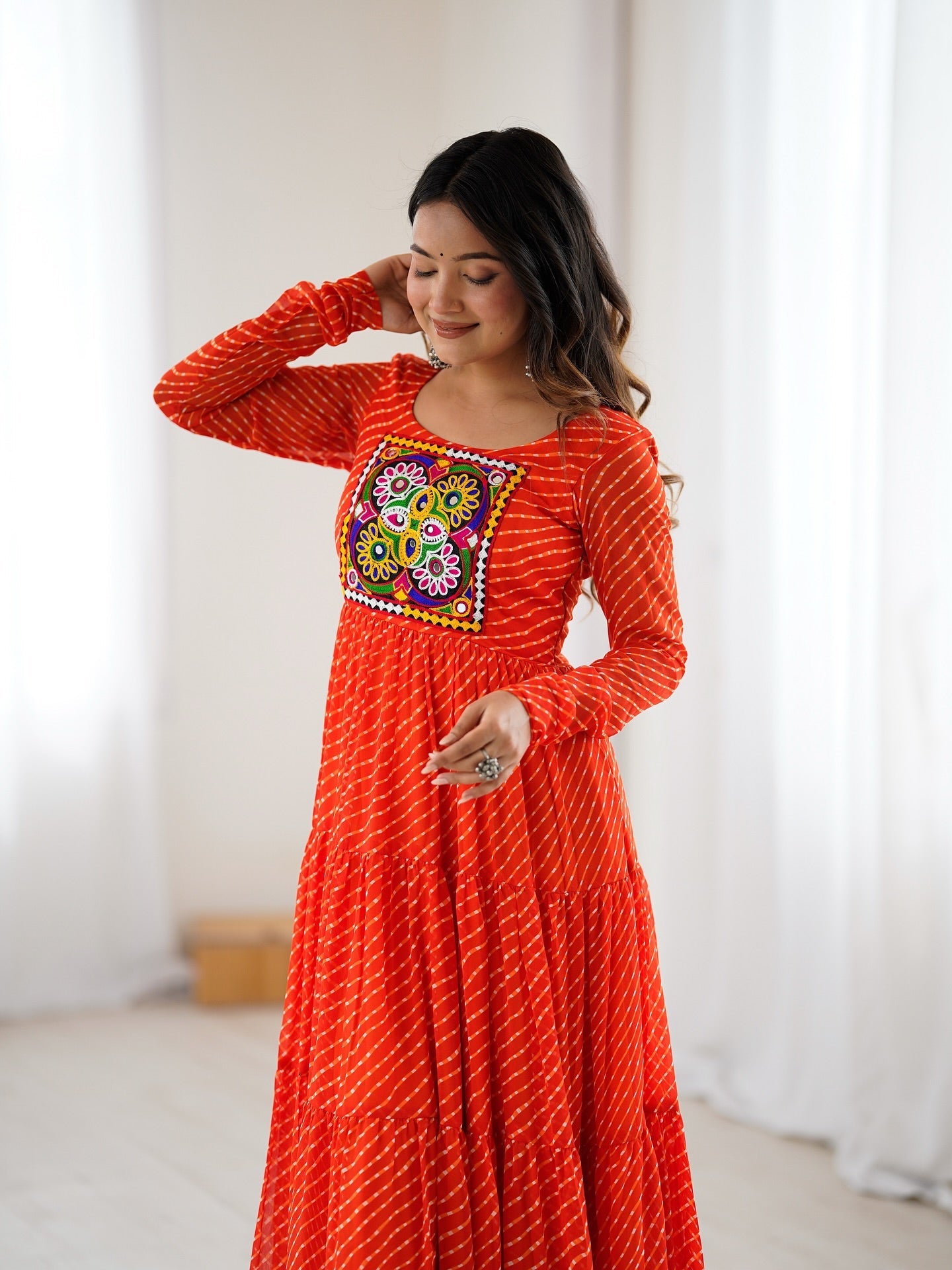 Manvitha orange georgette Leheriya printed Navratri gown