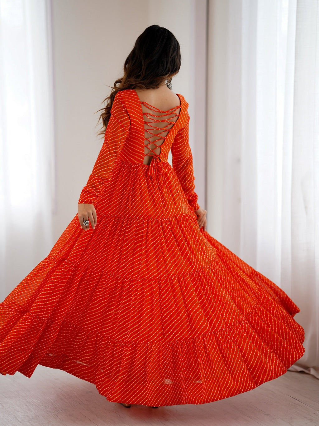Manvitha orange georgette Leheriya printed Navratri gown