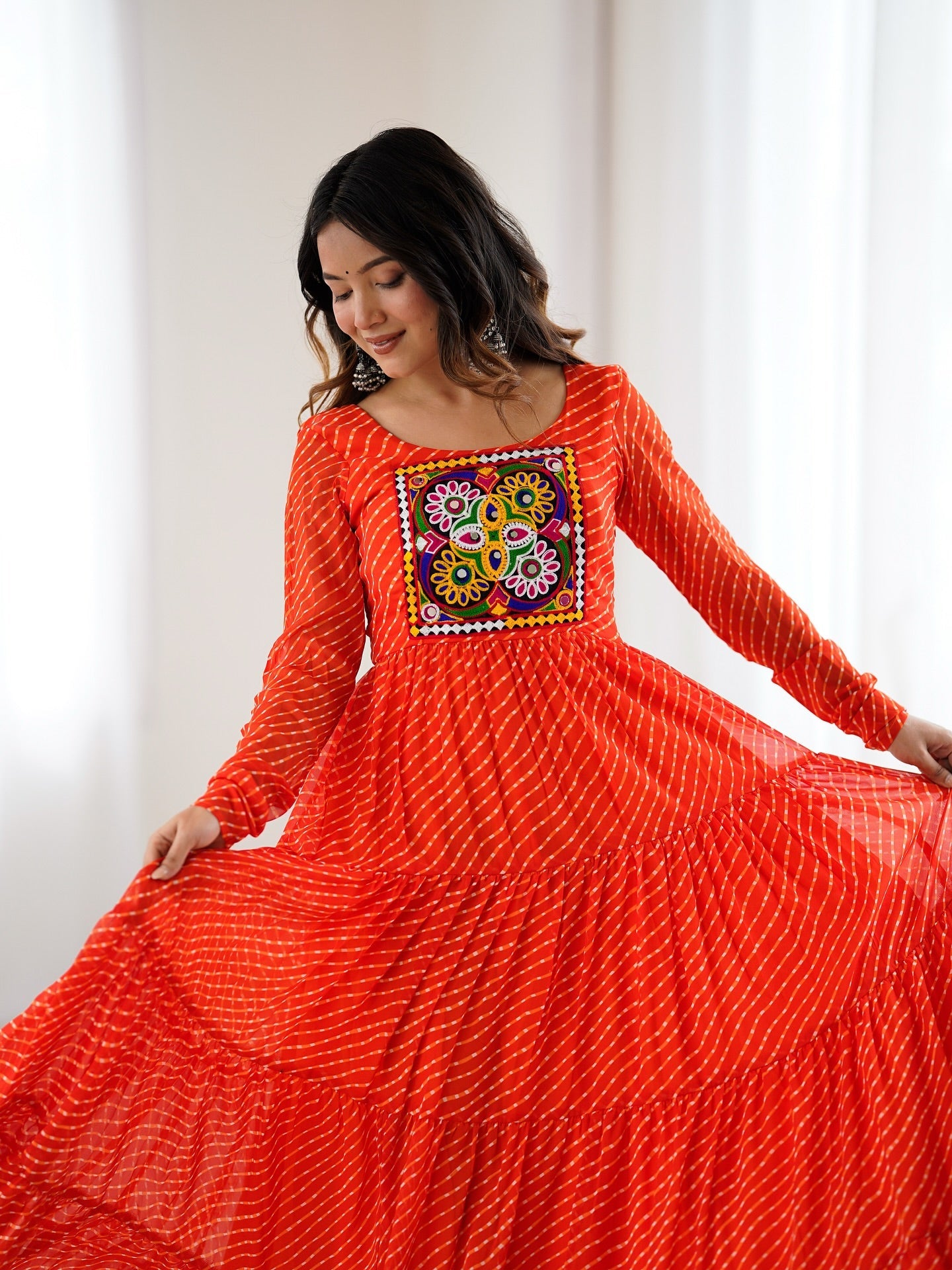 Manvitha orange georgette Leheriya printed Navratri gown