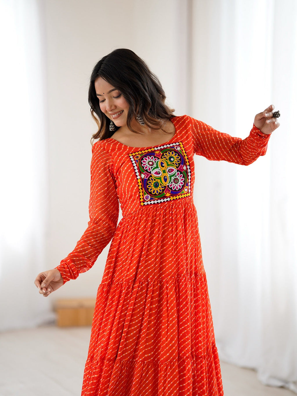 Manvitha orange georgette Leheriya printed Navratri gown