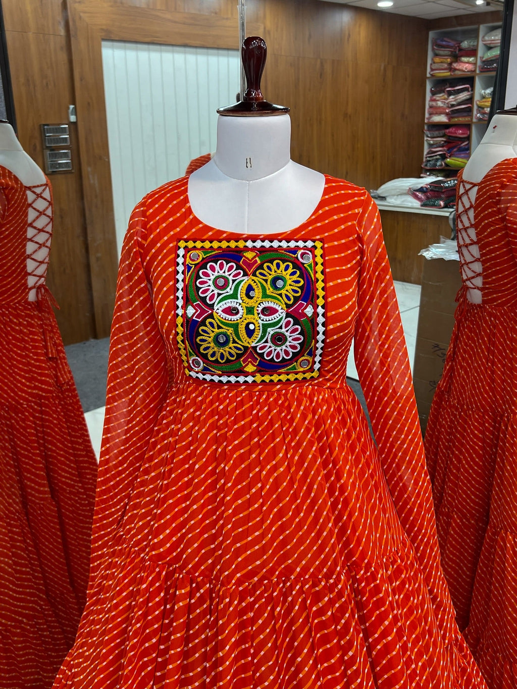 Manvitha orange georgette Leheriya printed Navratri gown
