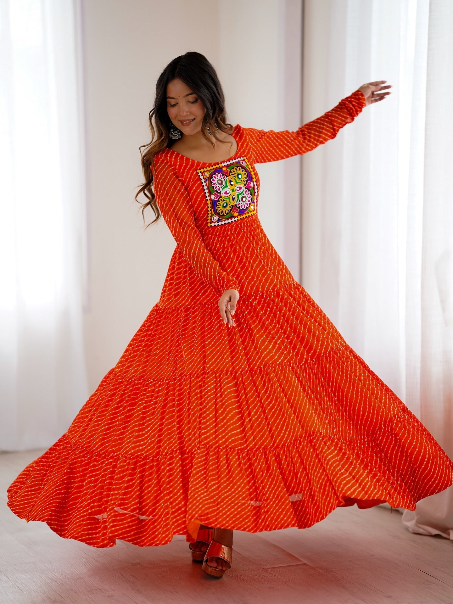 Manvitha orange georgette Leheriya printed Navratri gown