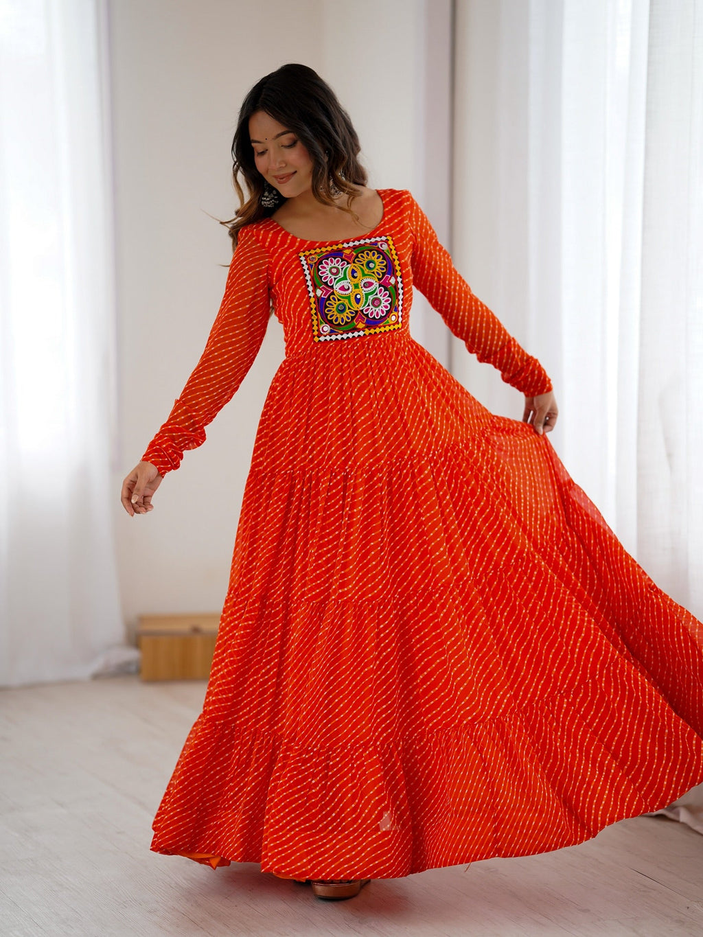 Manvitha orange georgette Leheriya printed Navratri gown