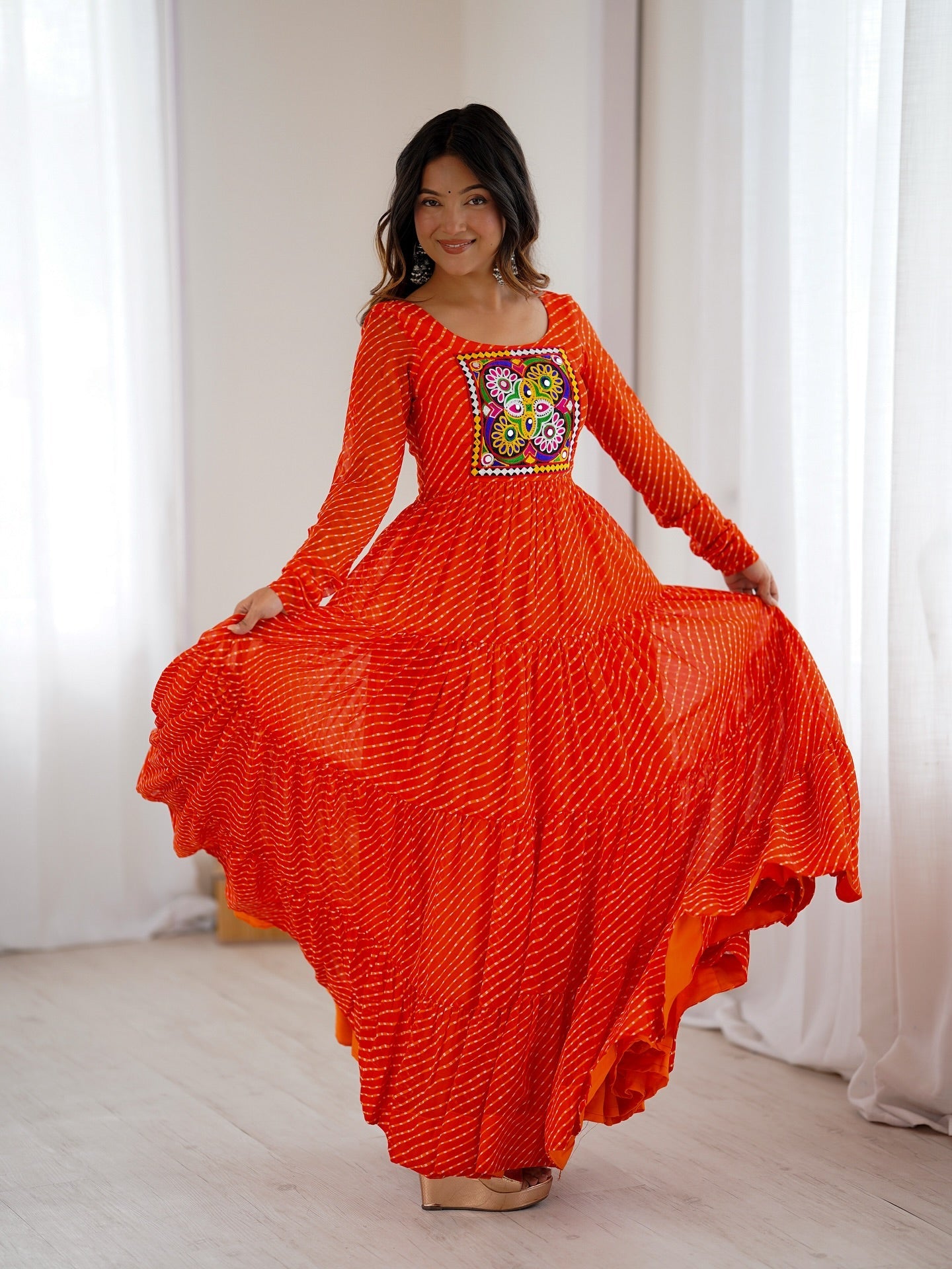 Manvitha orange georgette Leheriya printed Navratri gown
