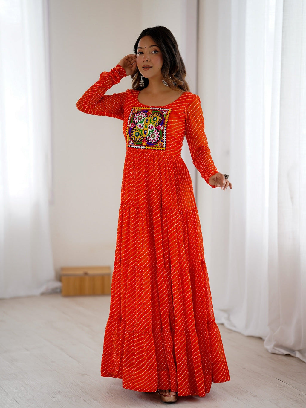 Manvitha orange georgette Leheriya printed Navratri gown