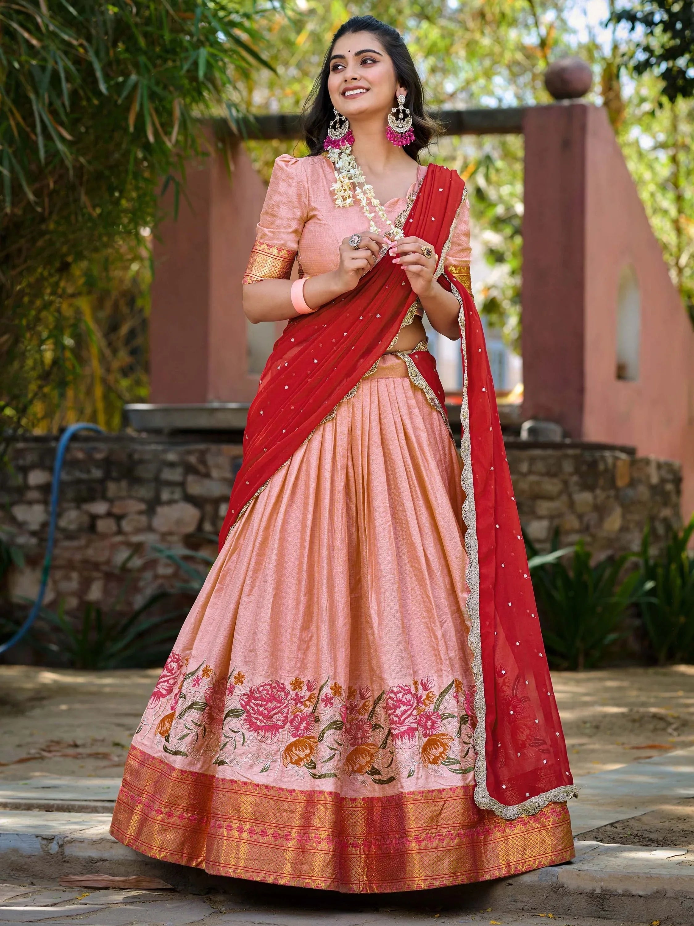 Elegant peach cotton silk lehenga choli set with intricate embroidery and dupatta