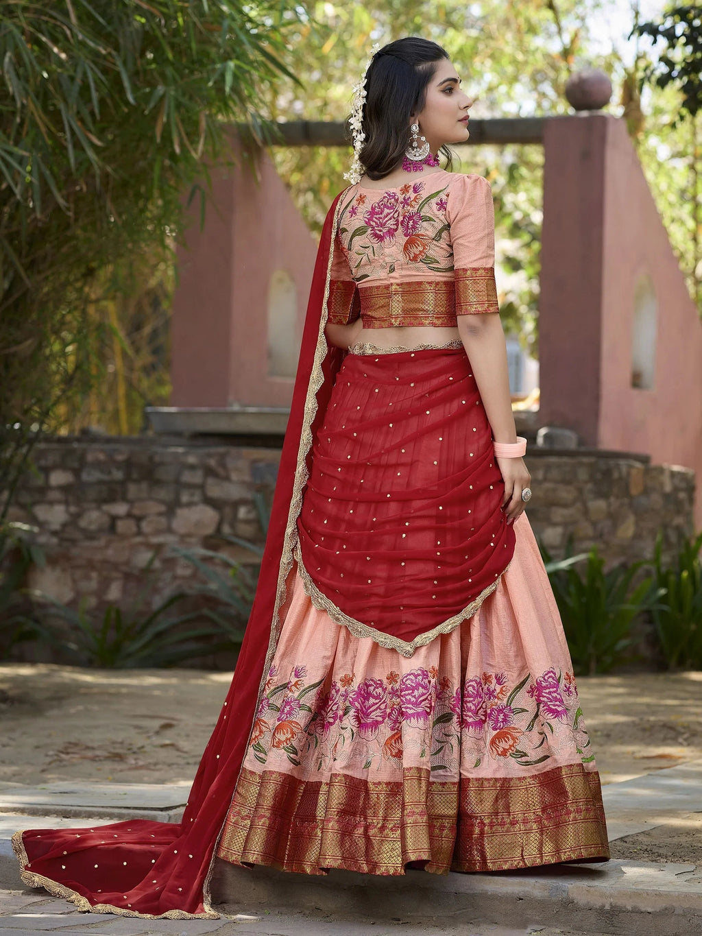 Elegant peach cotton silk lehenga choli set with intricate embroidery and dupatta