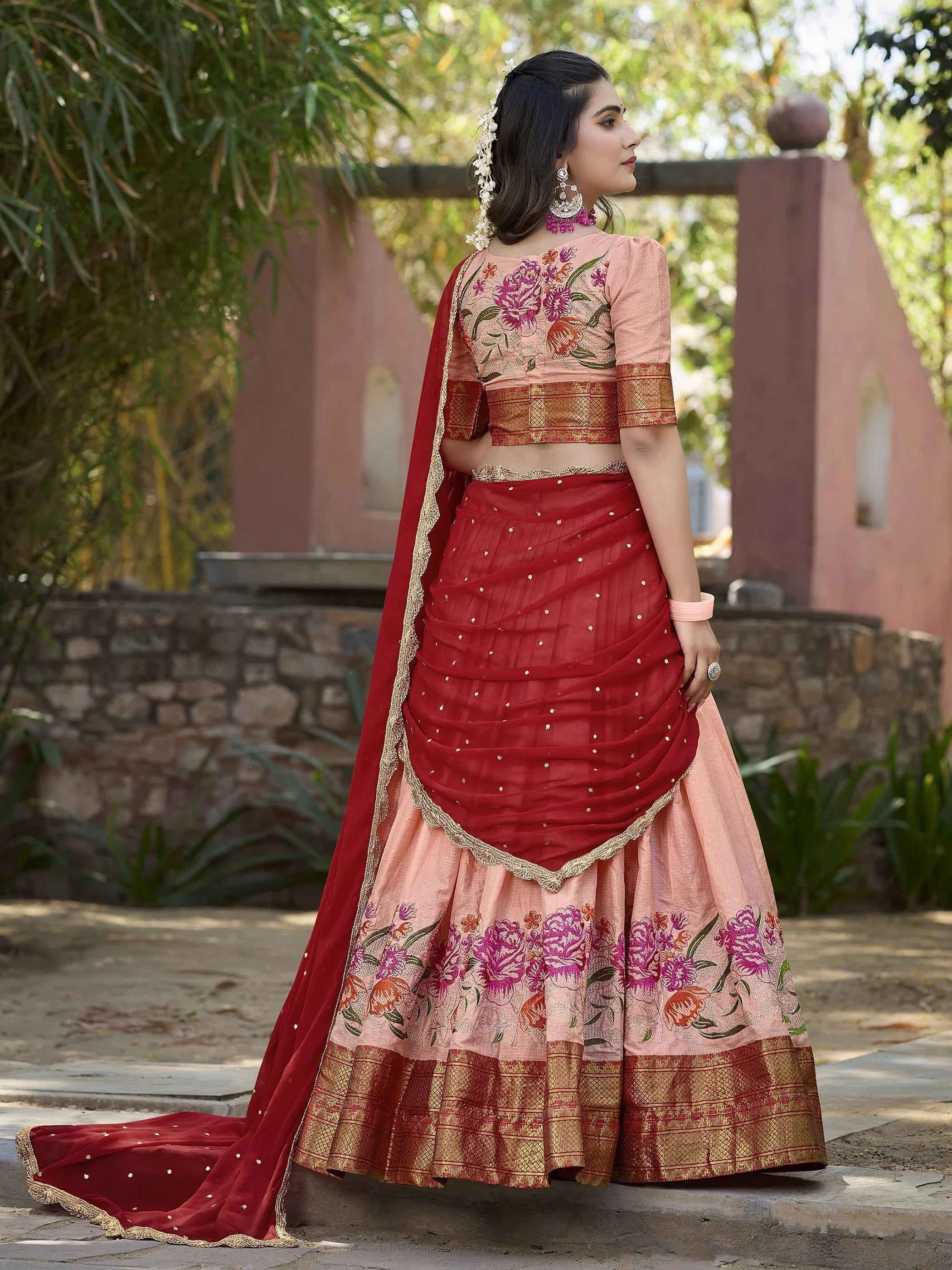 Elegant peach cotton silk lehenga choli set with intricate embroidery and dupatta
