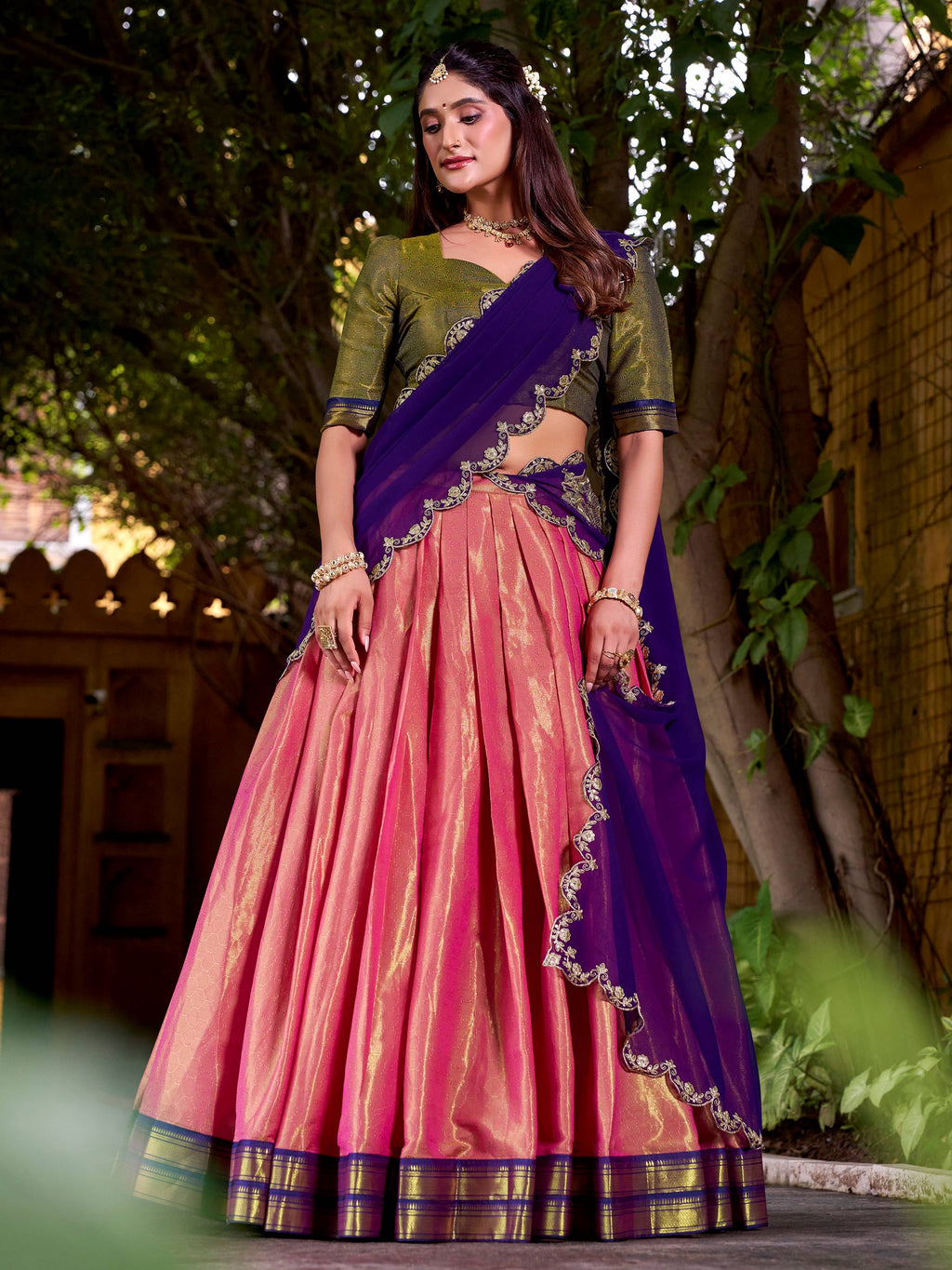 Peach kanchipuram silk lehenga choli with zari weaving and sequins embroidery