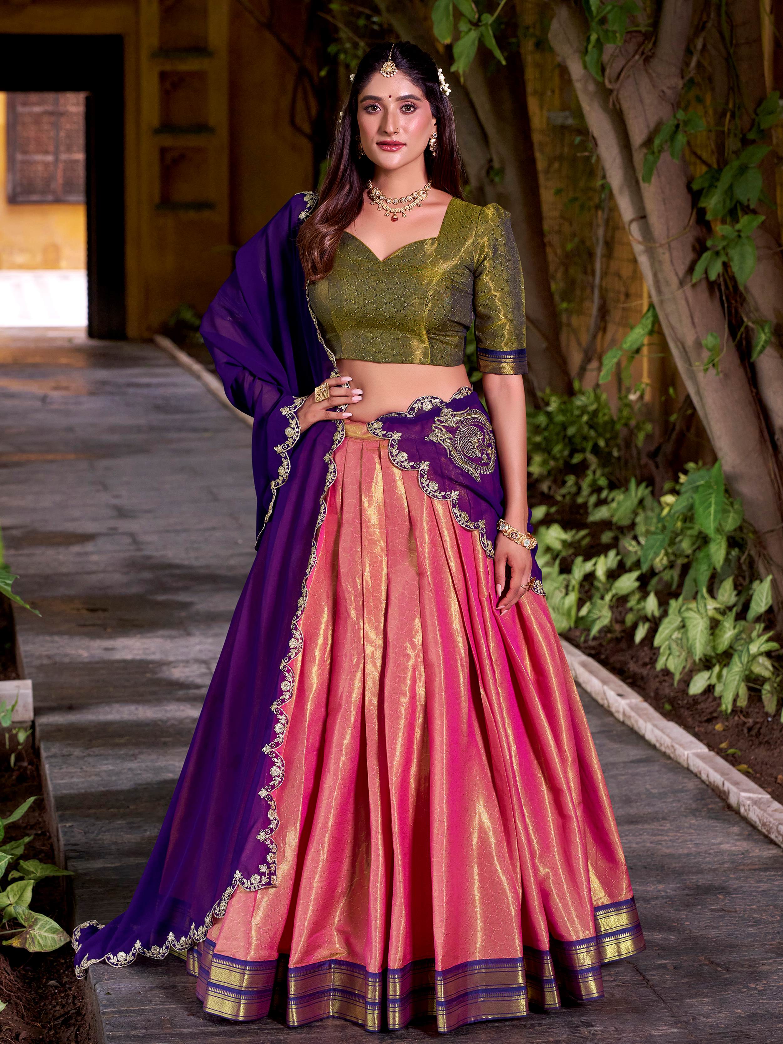 Peach kanchipuram silk lehenga choli with zari weaving and sequins embroidery