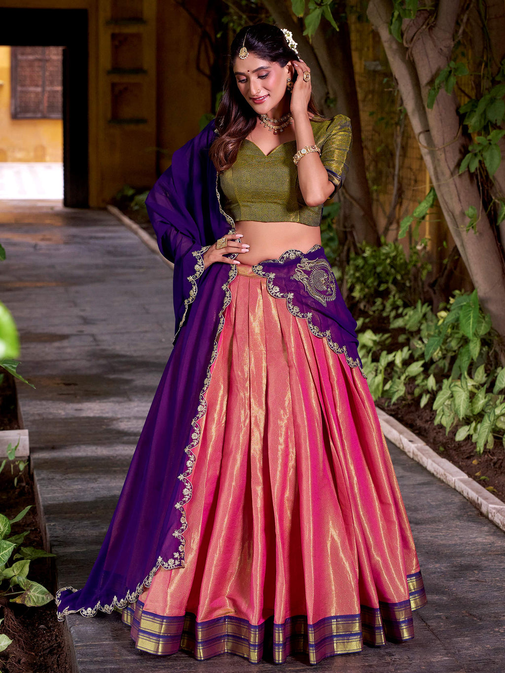 Peach kanchipuram silk lehenga choli with zari weaving and sequins embroidery