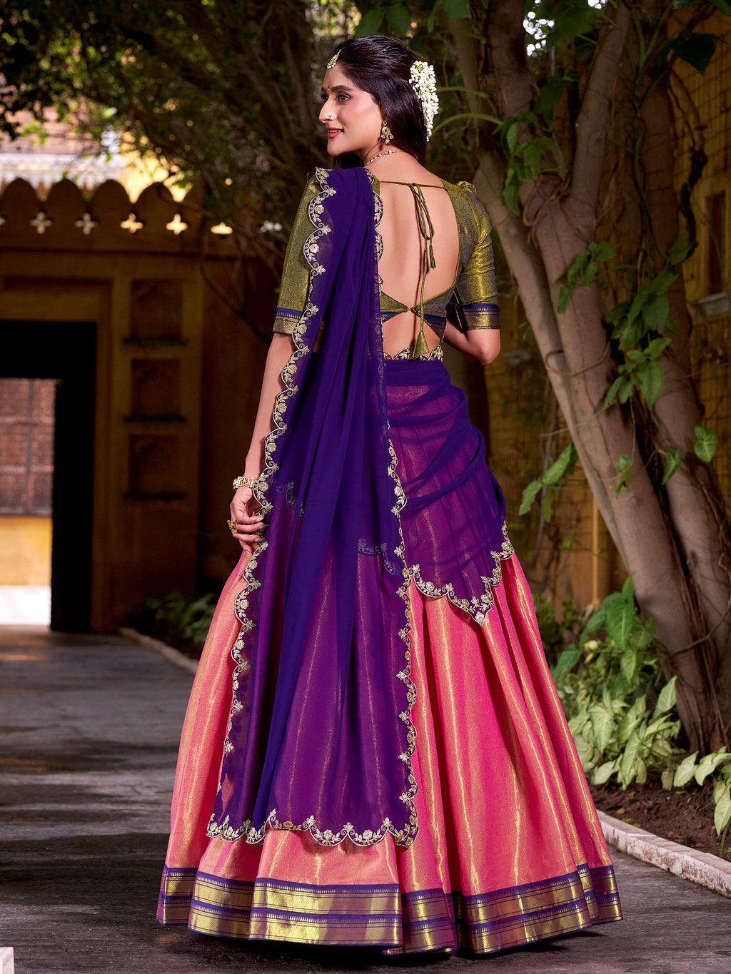 Peach kanchipuram silk lehenga choli with zari weaving and sequins embroidery