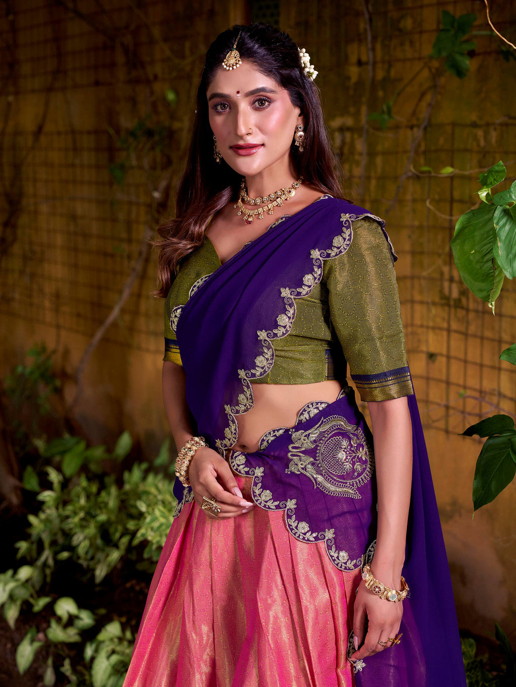 Peach kanchipuram silk lehenga choli with zari weaving and sequins embroidery
