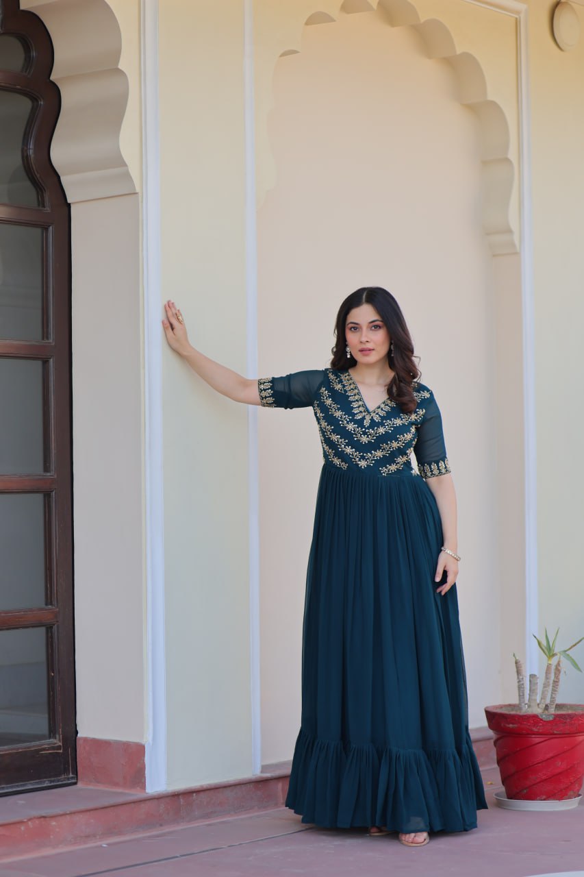 VAIDEHI FULLY FLARED RAMA FAUX BLOOMING GOWN WITH RICH SEQUINS BEADS EMBROIDERED WORK