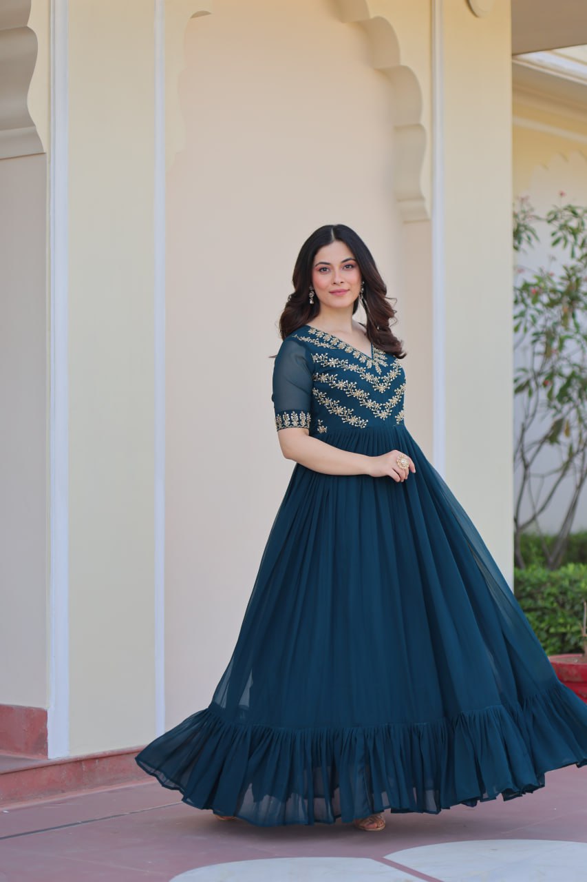 VAIDEHI FULLY FLARED RAMA FAUX BLOOMING GOWN WITH RICH SEQUINS BEADS EMBROIDERED WORK