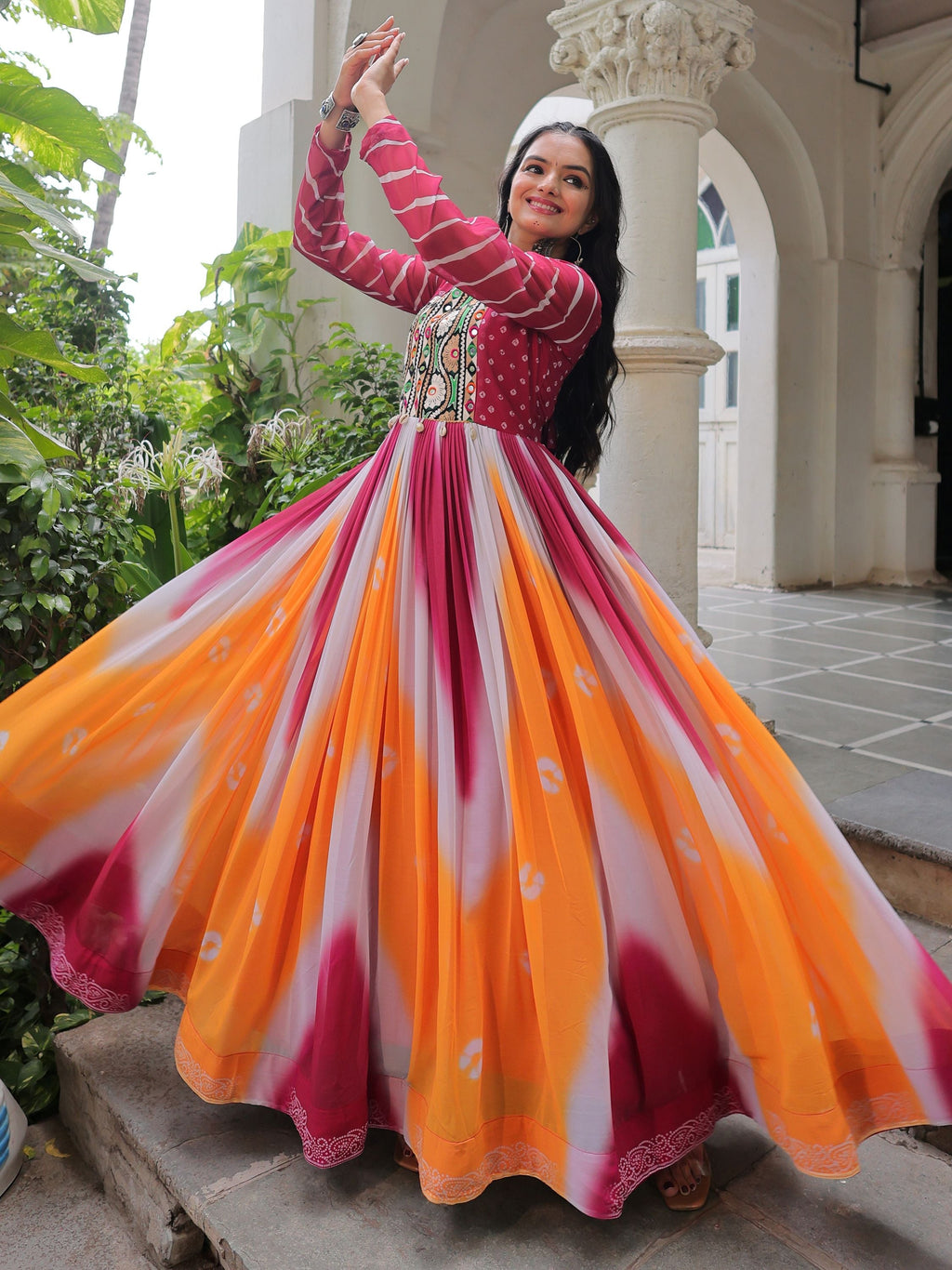 Pink georgette Bandhej print Gamthi embroidery mirror work gown