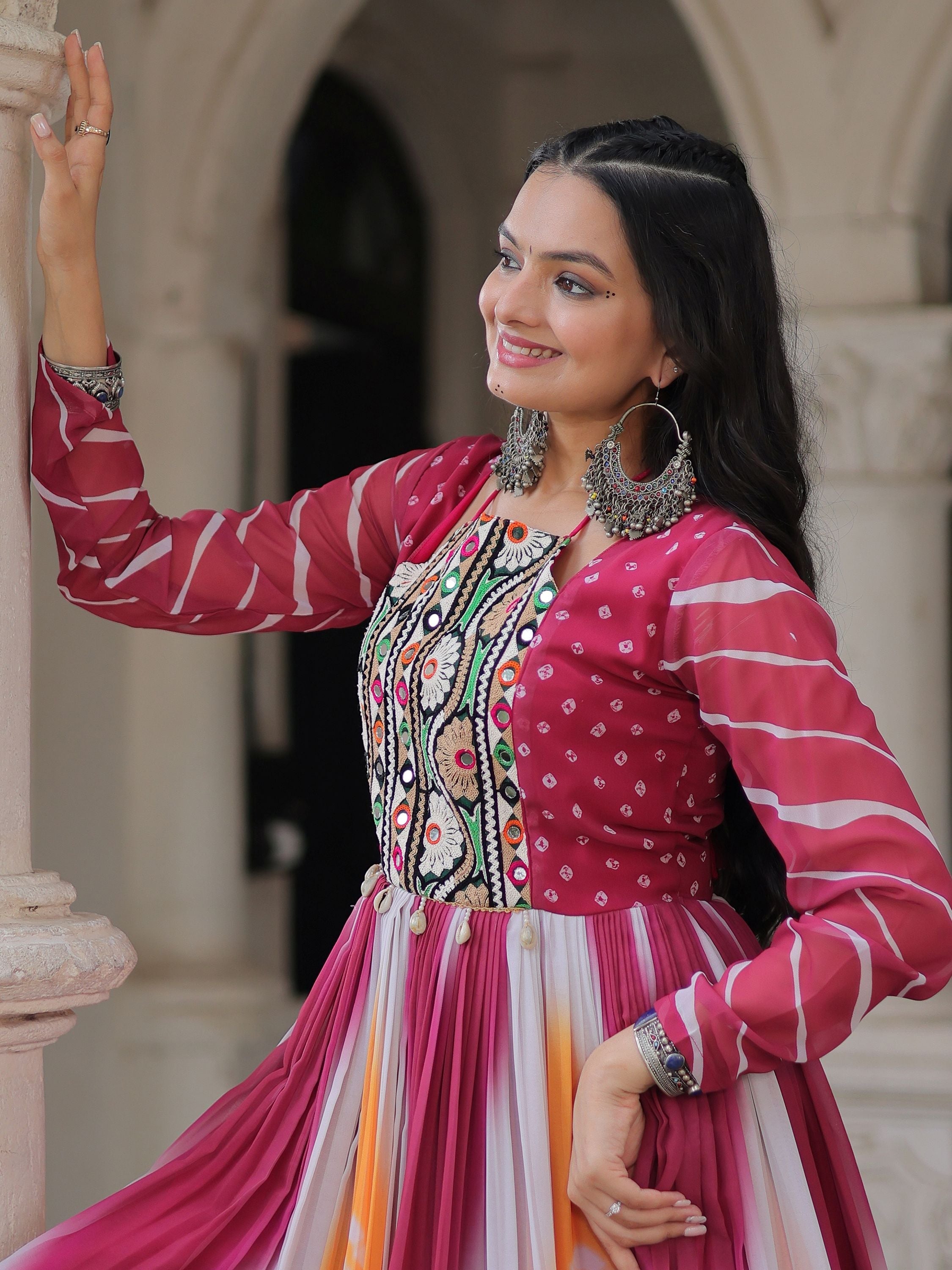 Pink georgette Bandhej print Gamthi embroidery mirror work gown